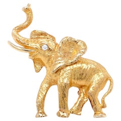 Vintage 1980s 14K Yellow Gold Elephant Pin/Brooch with Diamond Eye