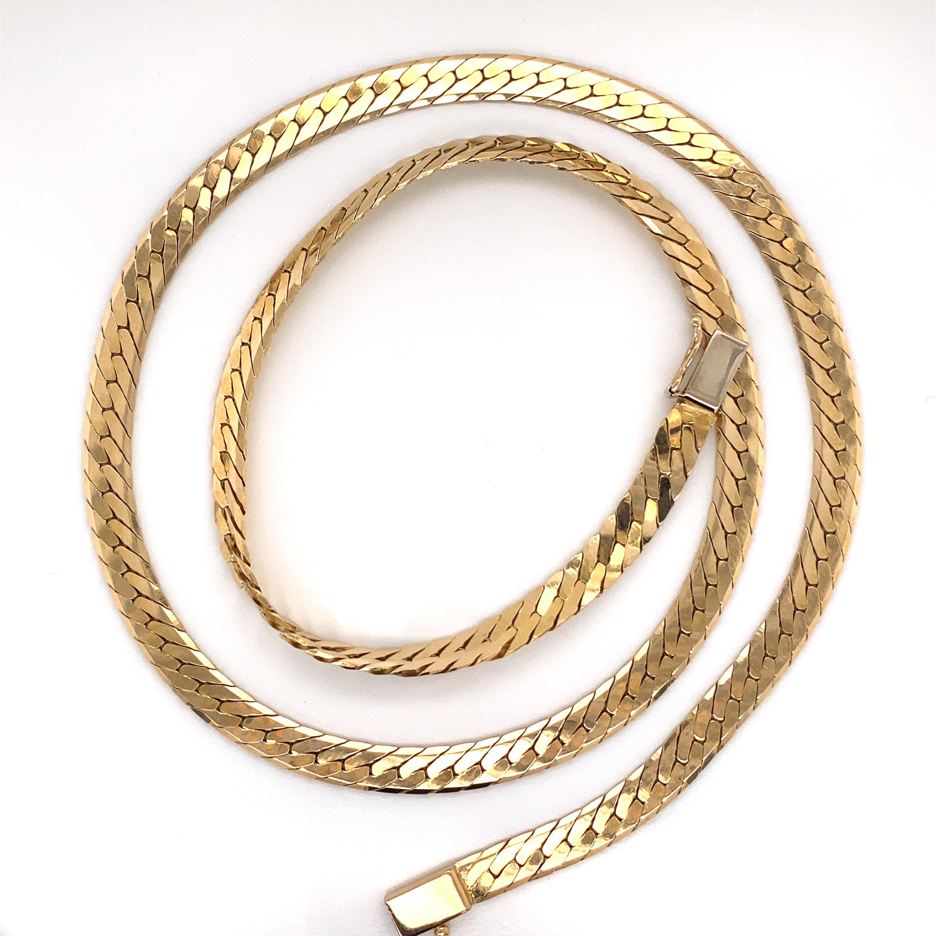 Vintage 1980’s 14K Yellow Gold Herringbone Necklace - The necklace is 5.1mm wide and 19 inches long and features a plunger clasp with a figure 8 safety. The necklace weighs 23.4 grams.