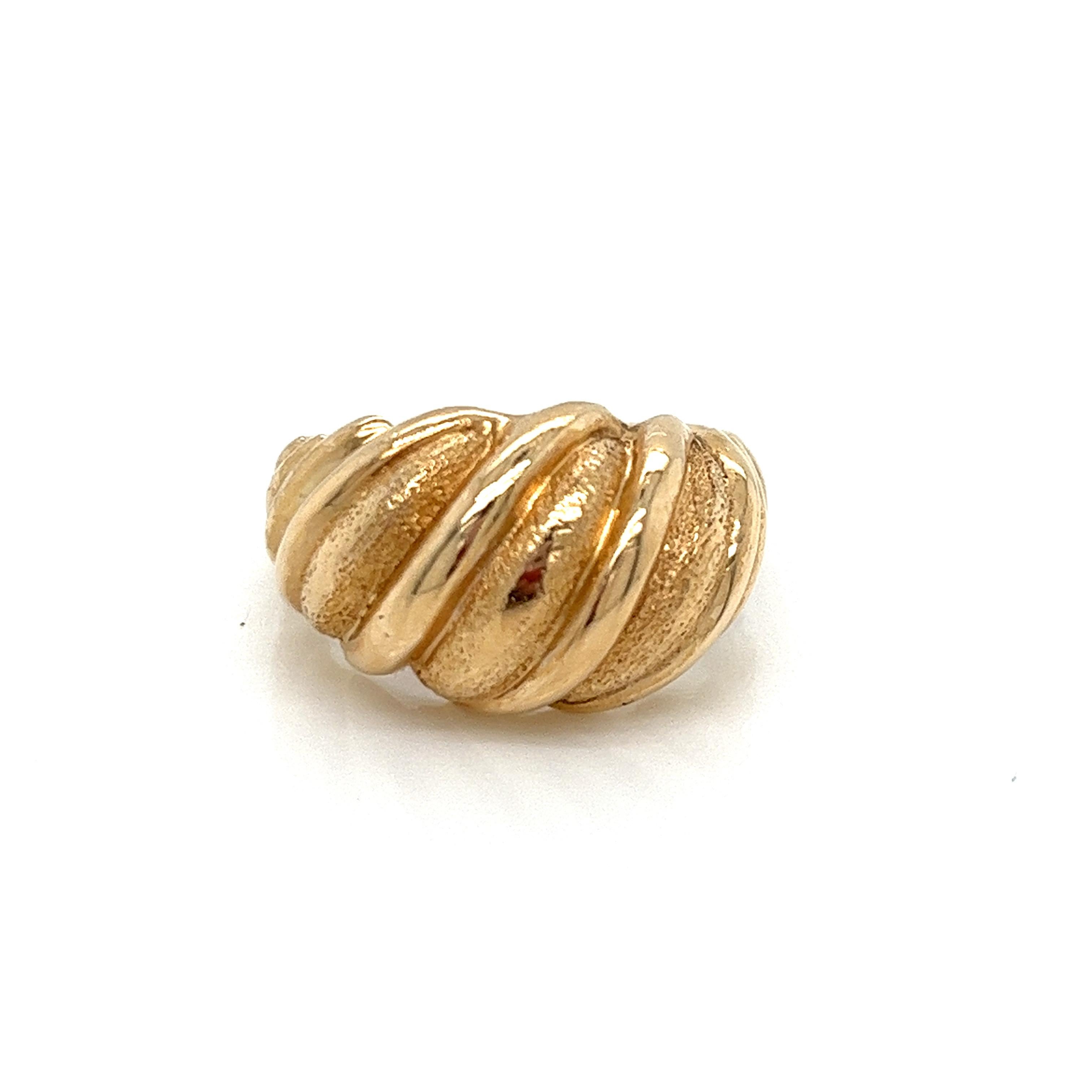 Vintage 1980's 14k Yellow Gold Shrimp Dome Statement Ring. The design is alternating shiny and textured ridges. The ring on top measures 12mm and tapers to 5mm on the side. The height of the ring off the finger is 6mm. The width of the band on the
