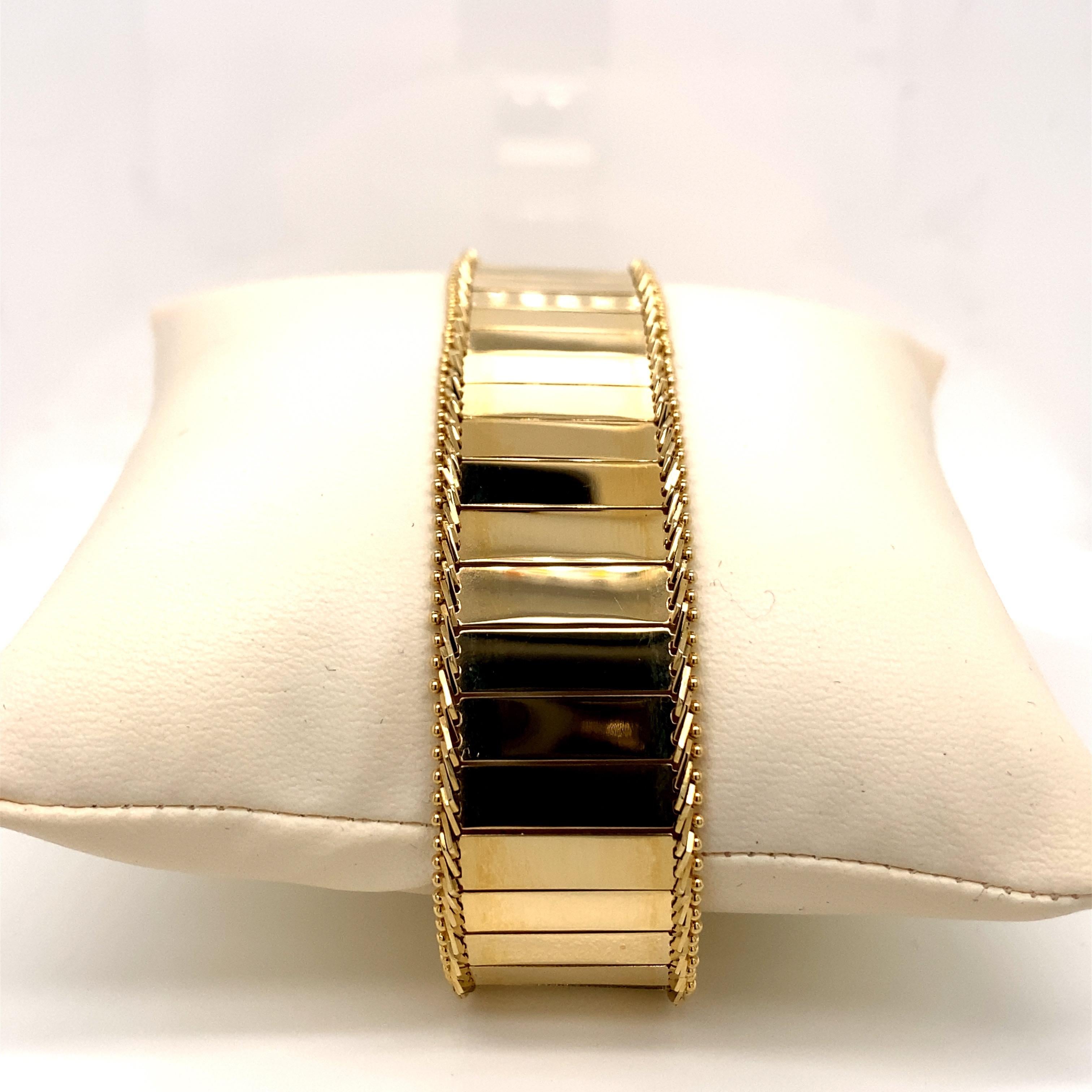 Modern Vintage 1980s 14 Karat Yellow Gold Wide Mirror Finish Link Bracelet For Sale