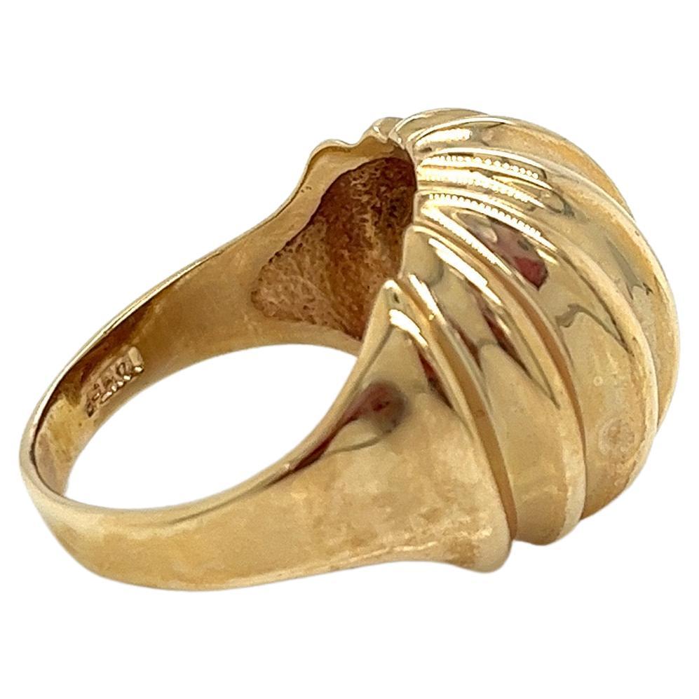 Vintage 1980's 14k Yellow Gold Wide Ribbed Dome Statement Ring. The top ribbed dome design measures 17.5mm tall and 21mm wide. The dome sits 8mm high off the finger. The width of the band on the side is 8mm and tapers down to 3.4mm on the bottom.