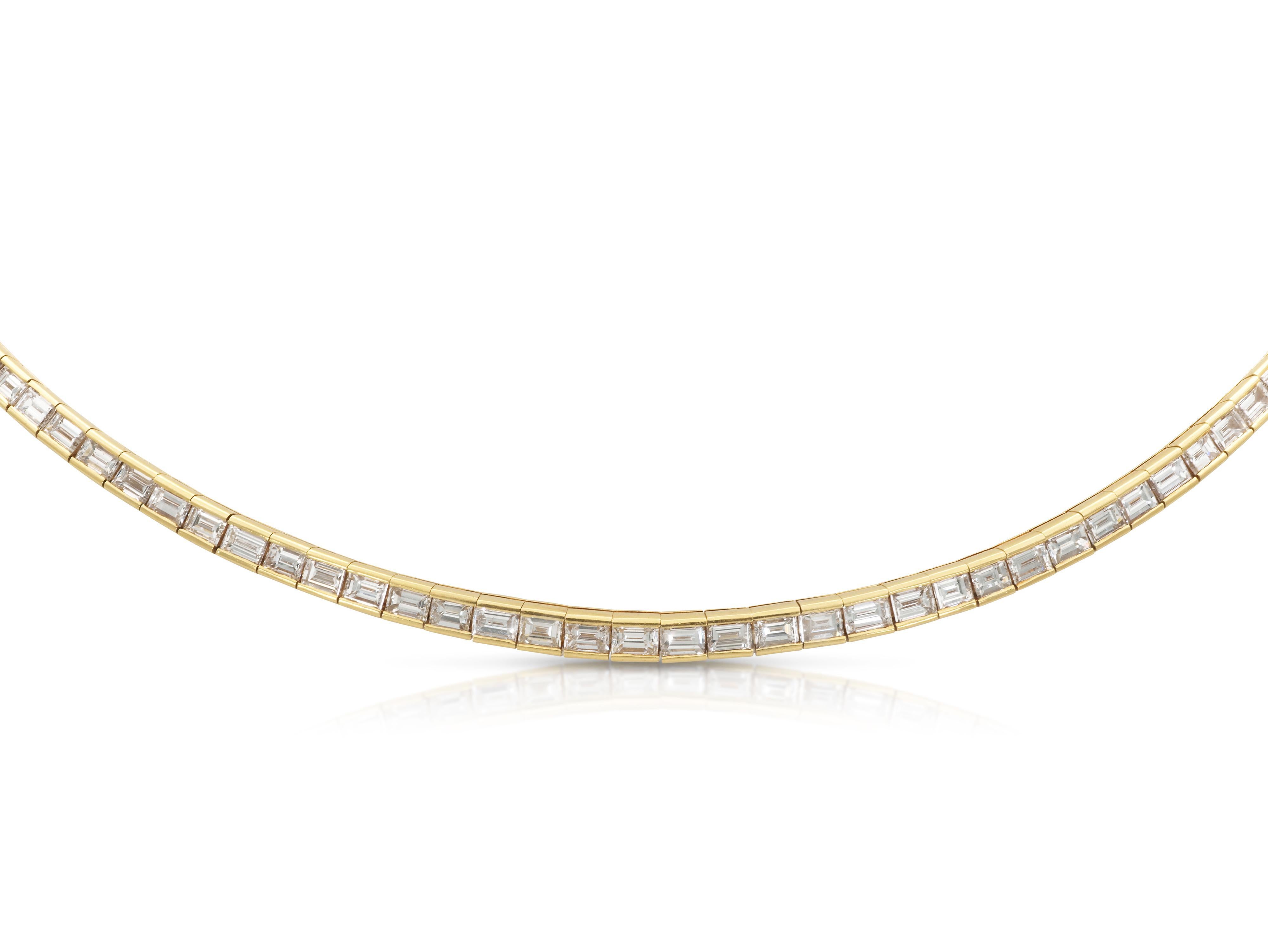Finely crafted in 18k yellow gold with 116 channel set Baguette cut Diamonds weighing approximately a total of 15.00 carats.
Circa 1980s
16 inches long