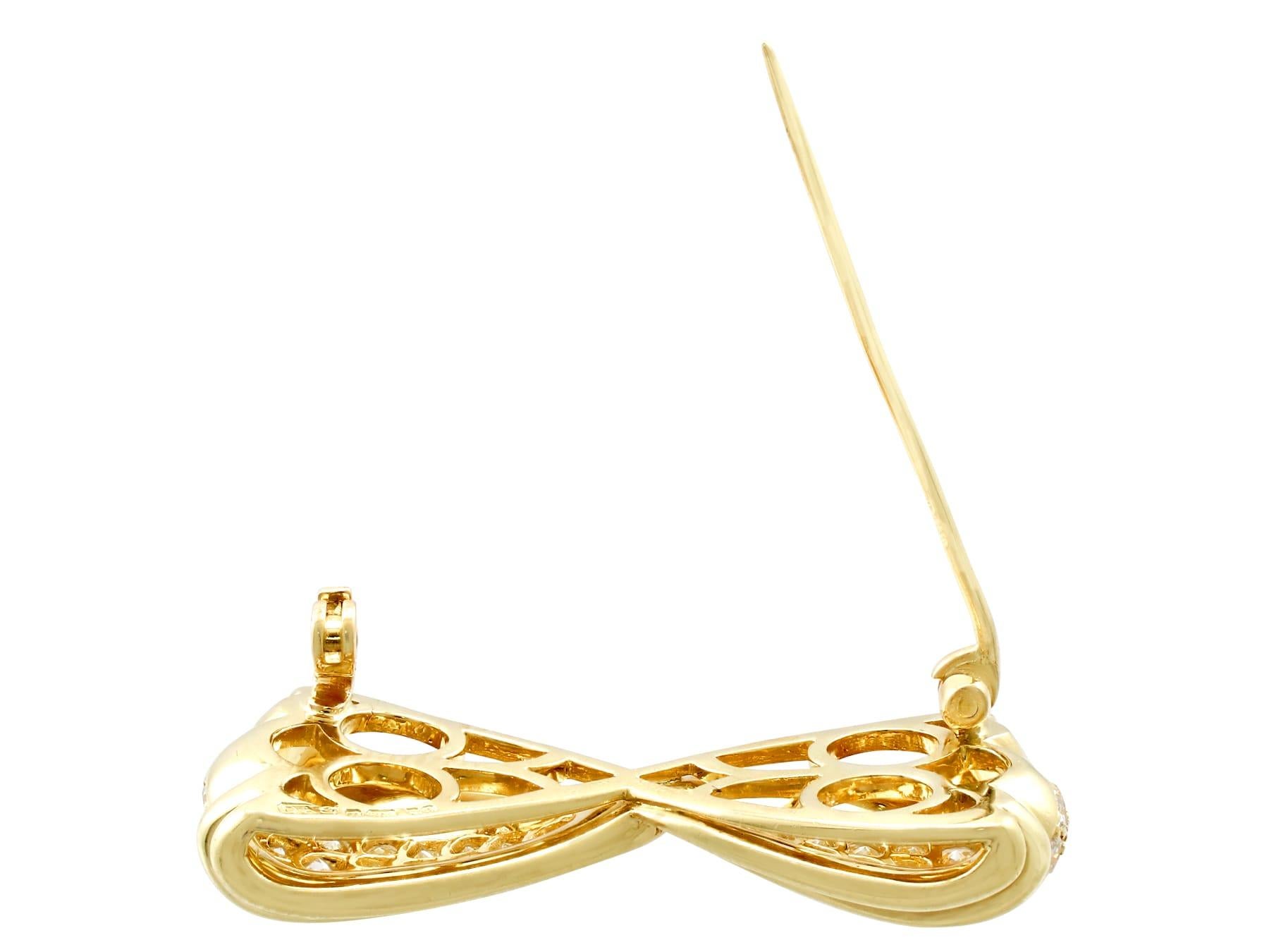 Women's Vintage 1980s 1.68 Carat Diamond and Yellow Gold Bow Brooch For Sale