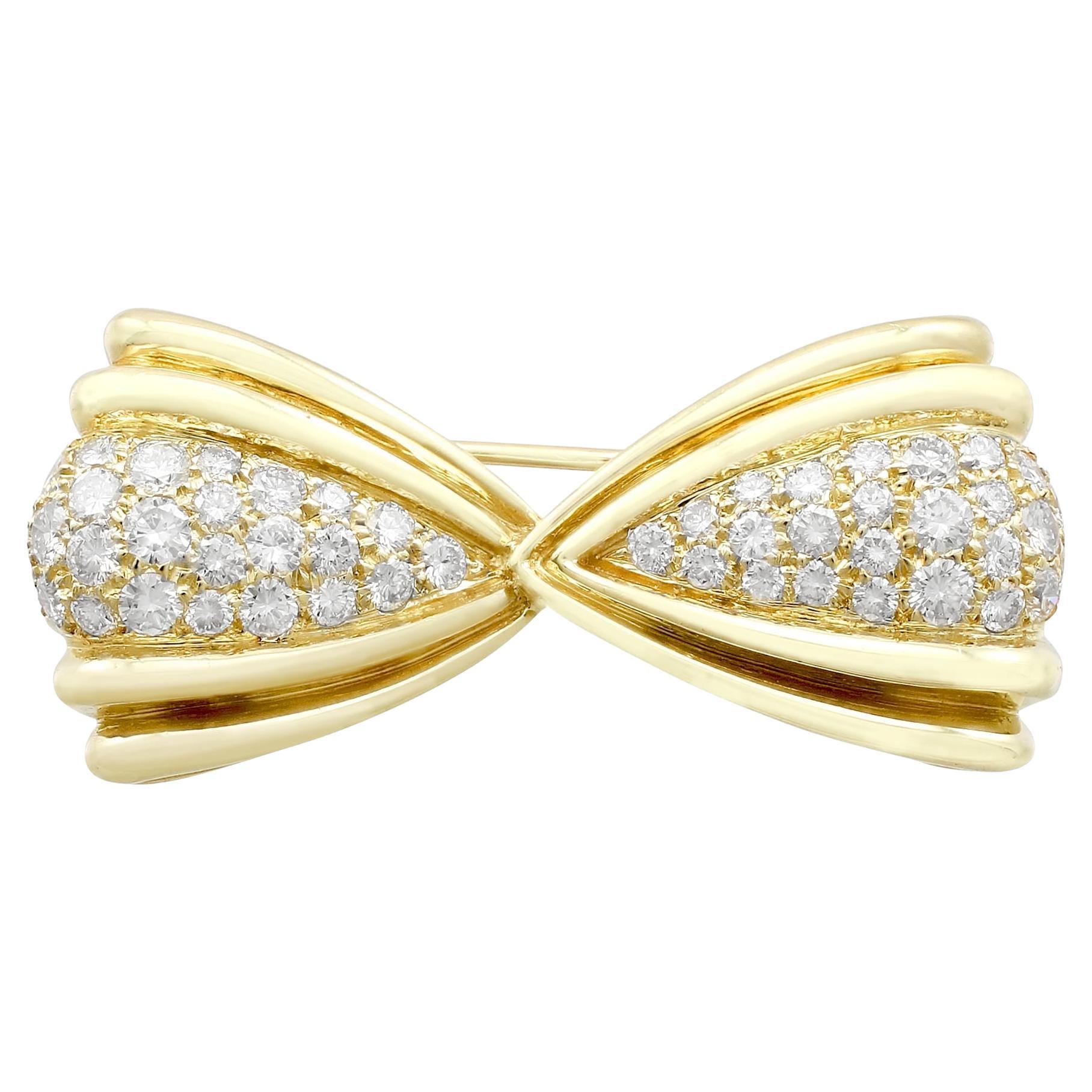 Vintage 1980s 1.68 Carat Diamond and Yellow Gold Bow Brooch For Sale