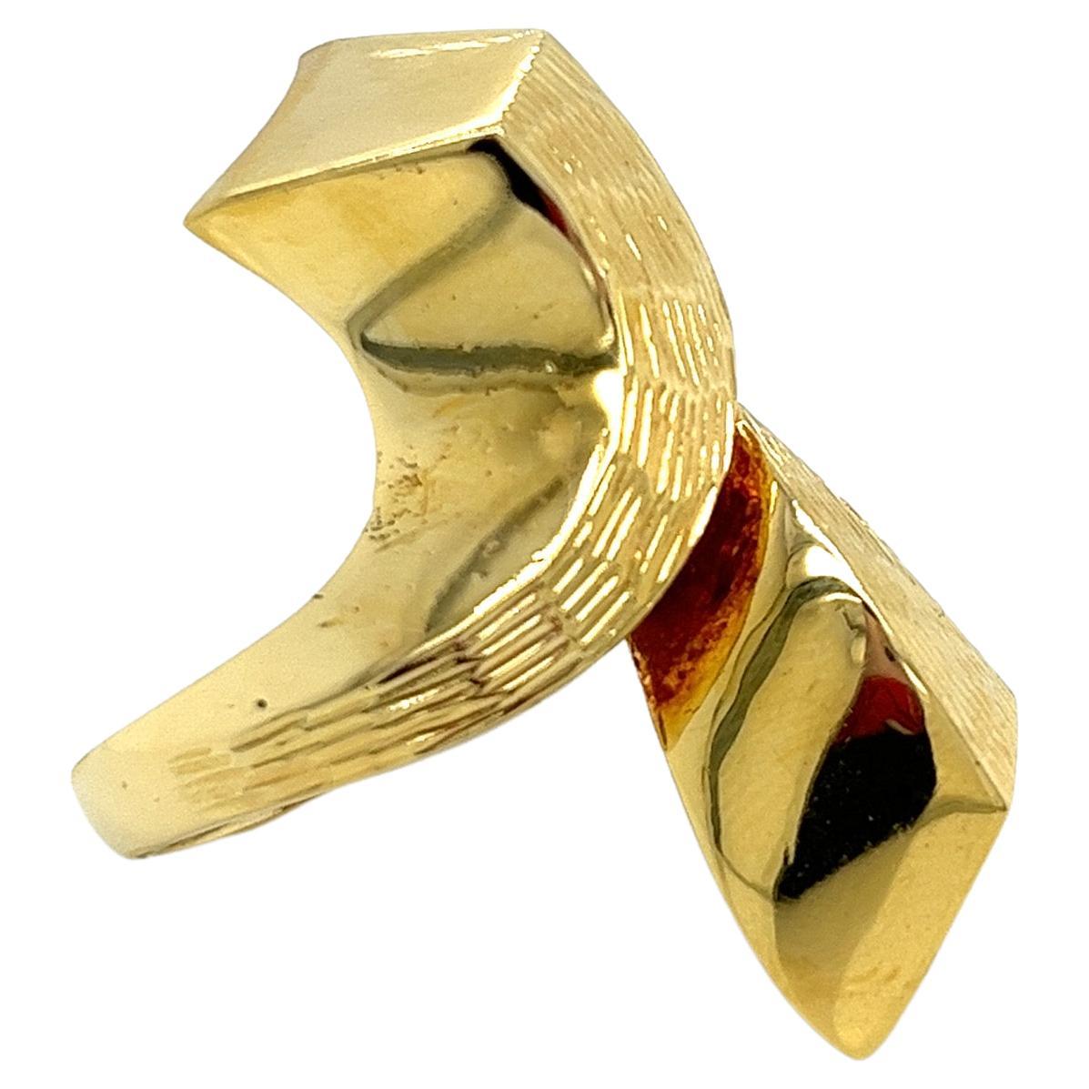 Vintage 1980's 18k Yellow Gold Bold Bypass Statement Ring. The 18k yellow gold ring has a textured finish top and measures 1.40