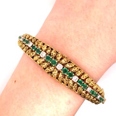 Vintage 1980's 18k Yellow Gold Emerald and Diamond Bangle