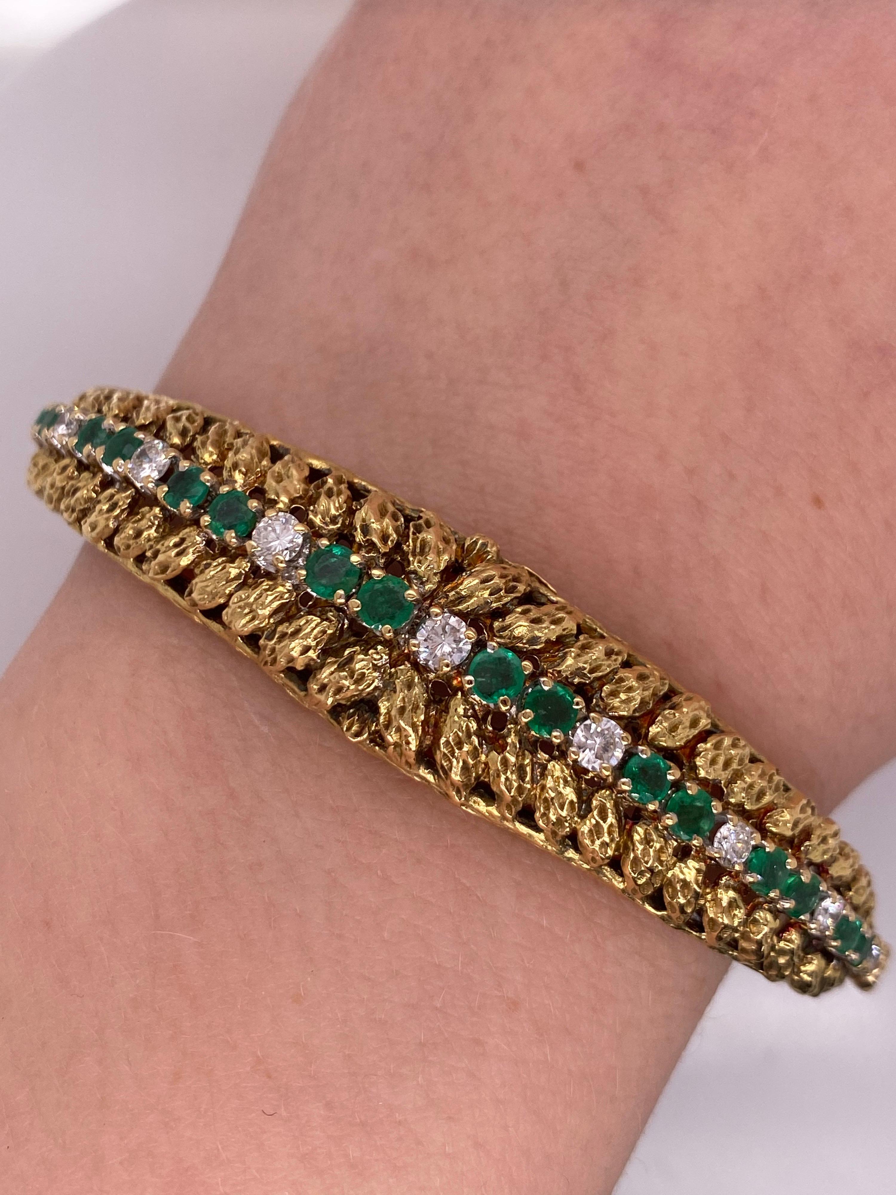 Contemporary Vintage 1980's 18k Yellow Gold Emerald and Diamond Bangle For Sale