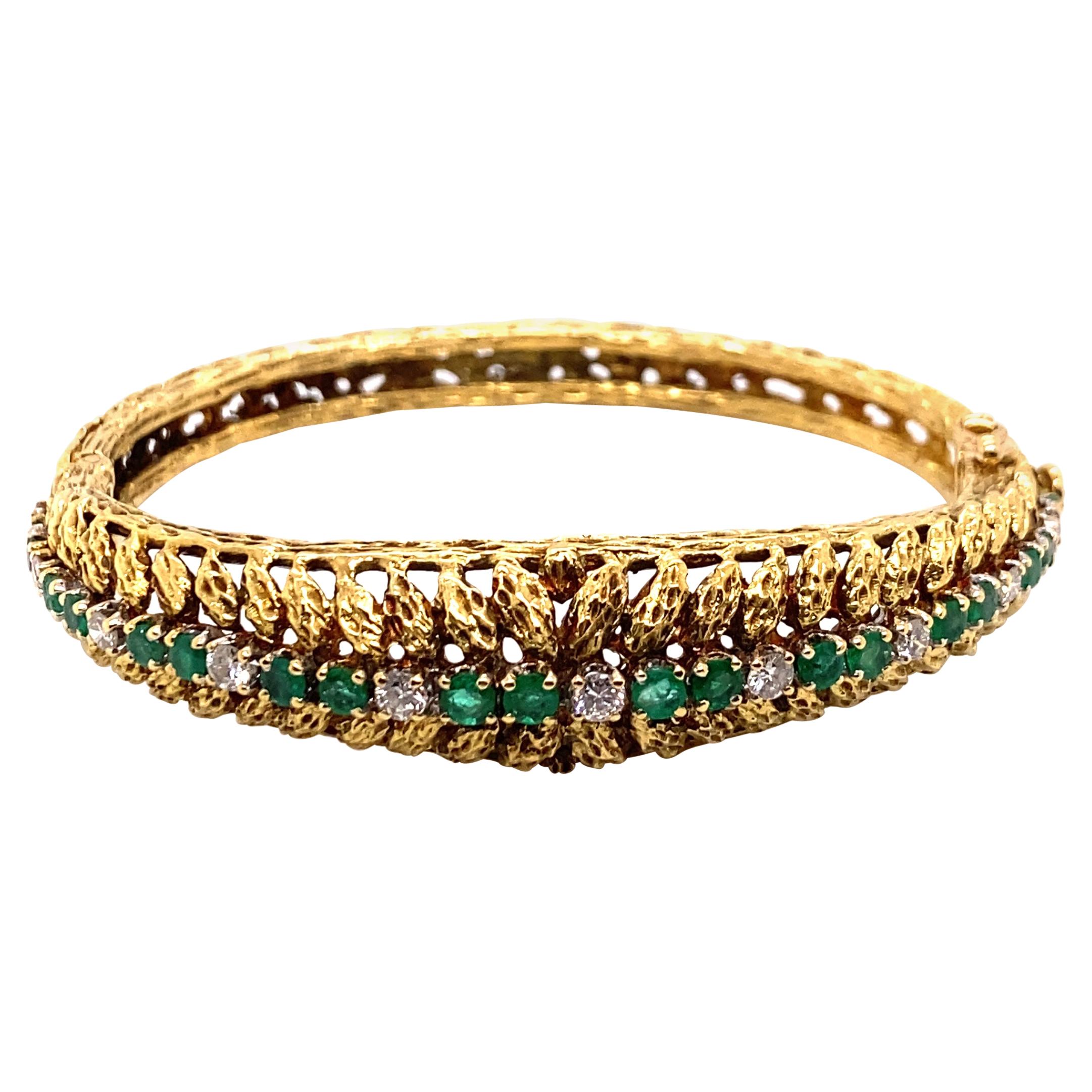 Vintage 1980's 18k Yellow Gold Emerald and Diamond Bangle For Sale
