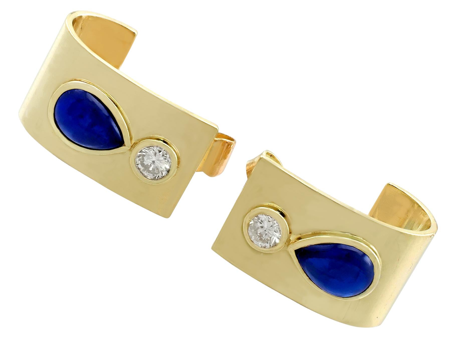 An impressive pair of vintage 2.50 carat sapphire and 0.18 carat diamond, 14 karat yellow gold earrings; part of our diverse sapphire jewelry collections.

These fine and impressive vintage sapphire earrings have been crafted in 14k yellow