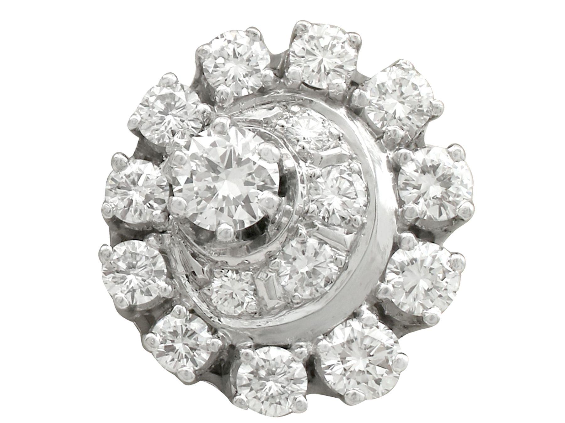 A stunning pair of 3.05 carat diamond and 18 karat white gold, platinum set cluster style stud earrings; part of our diverse antique jewelry and estate jewelry collections.

These stunning, fine and impressive vintage diamond cluster earrings have