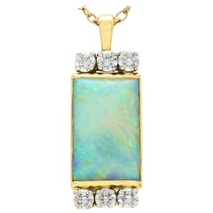 Vintage 1980s 3.18 Carat Opal and Diamond Gold Pendant