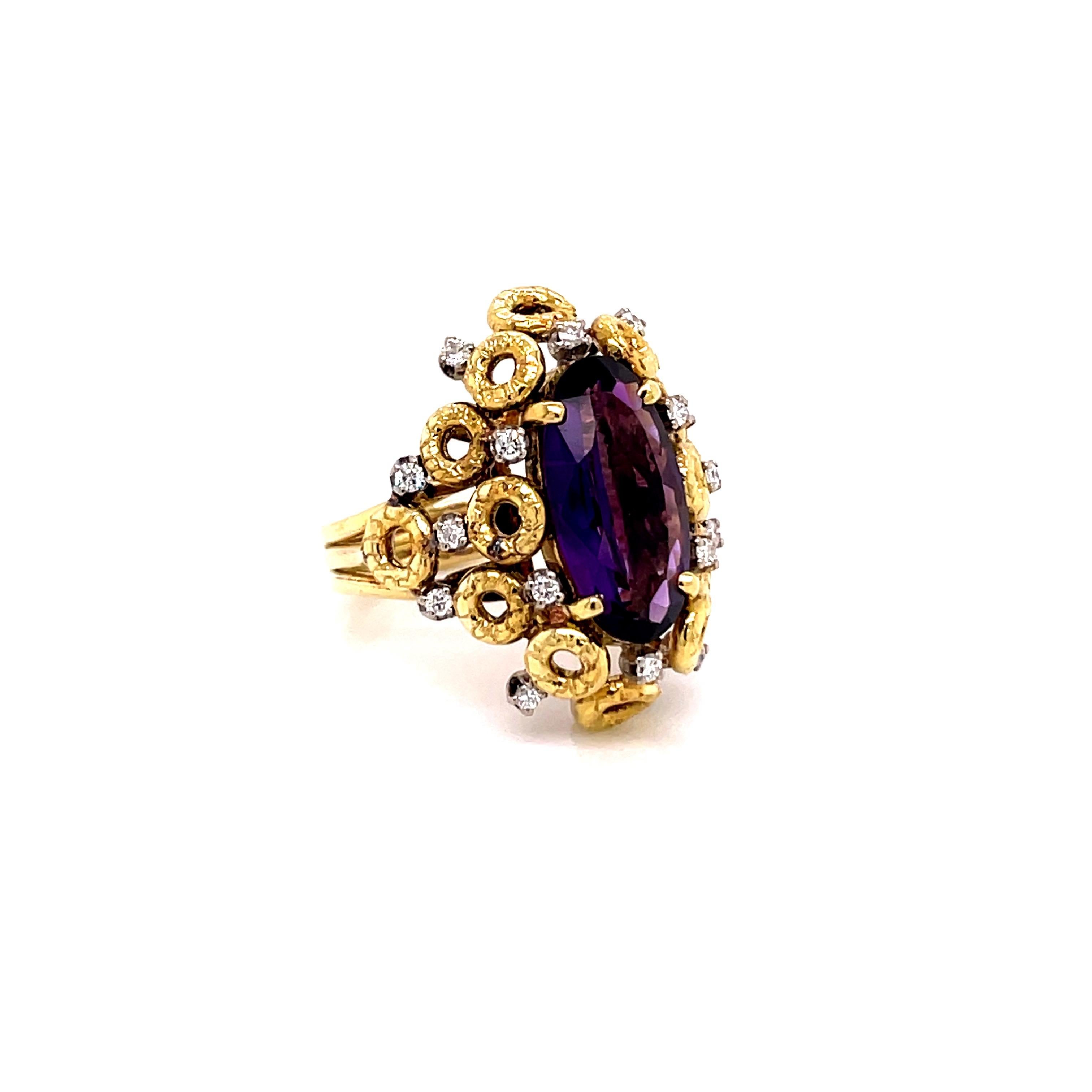 Vintage 1980's 3ct Oval Cut Amethyst Ring with Diamonds - the amethyst weighs approximately 3ct and measures 16 x 8mm.  It is accented with 16 round brilliant diamonds weighing approximately .25ct G - H color and VS2 - SI1 clarity.  The setting is