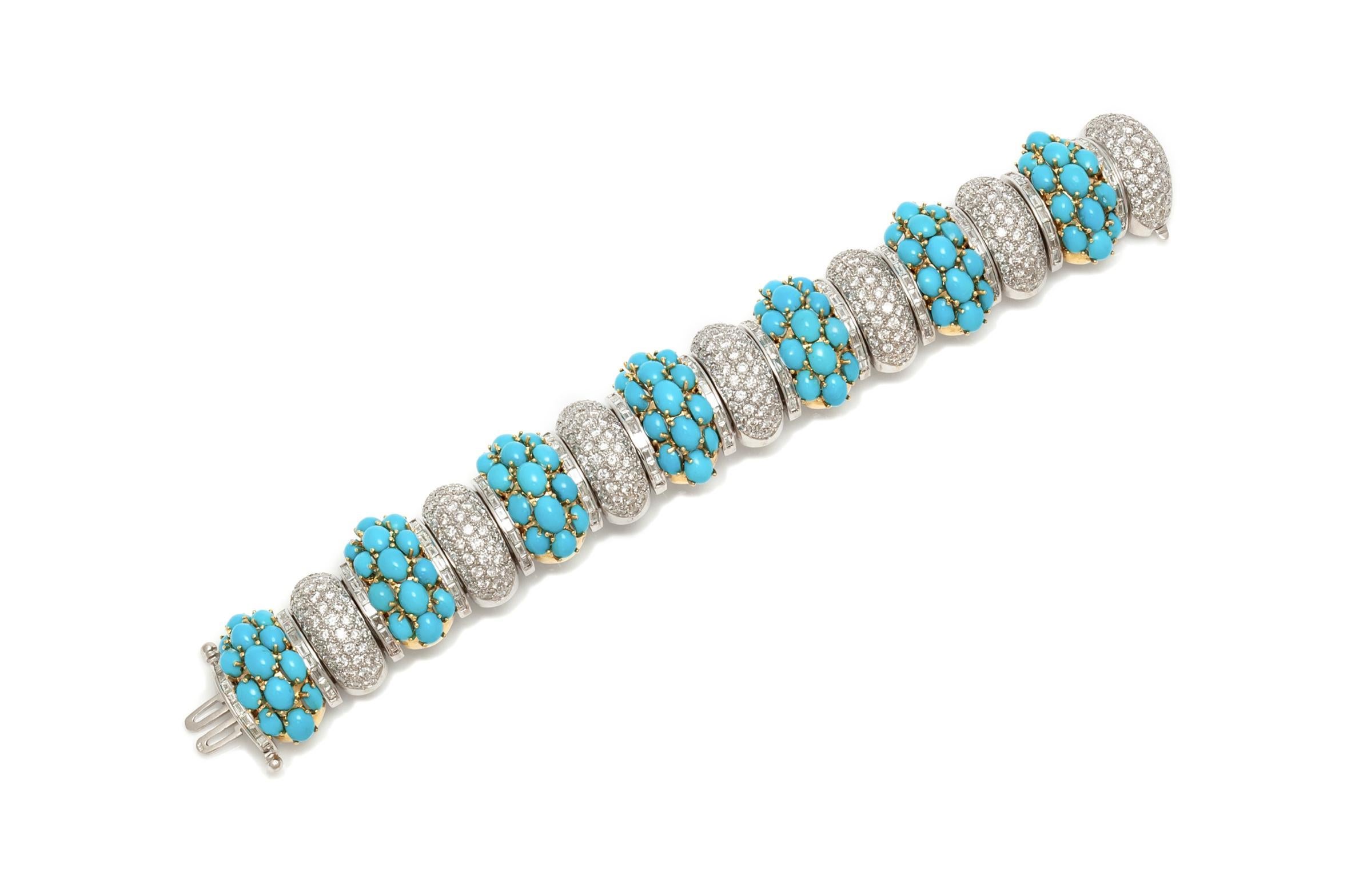 Finely crafted in 18k white and yellow gold with Cabochon Turquoises weighing a total of 41.75 carats, and Round Brilliant and Baguette cut Diamonds weighing a total of 15.75 carats.
Circa 1980s
Size 7 inches
