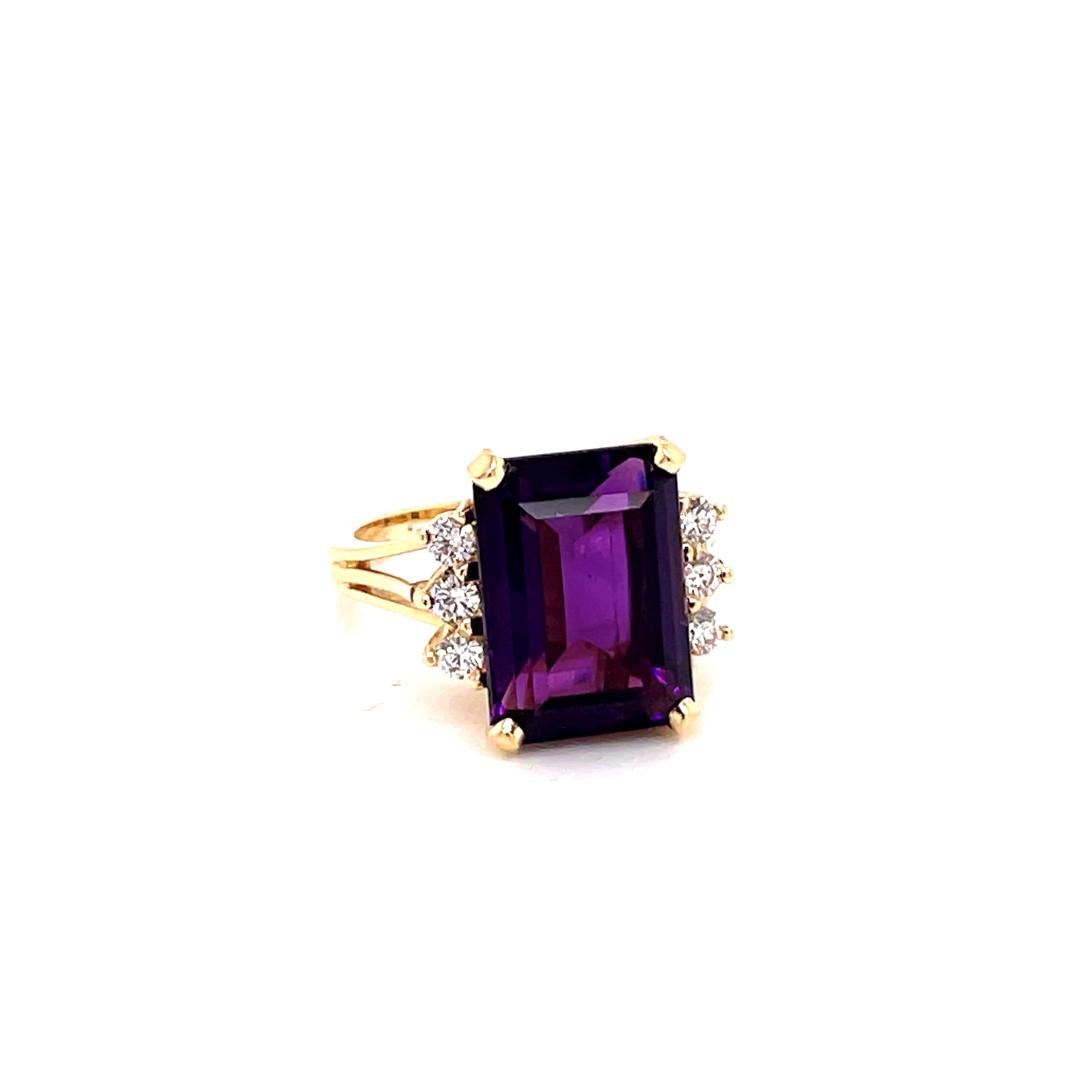 Vintage 1980's 7.35ct Emerald cut Amethyst Ring with Diamonds - the amethyst weighs approximately 7.35ct and measures 14 x 10mm.  It is accented with 6 round brilliant diamonds weighing approximately .30ct G - H color and SI clarity.  The setting is
