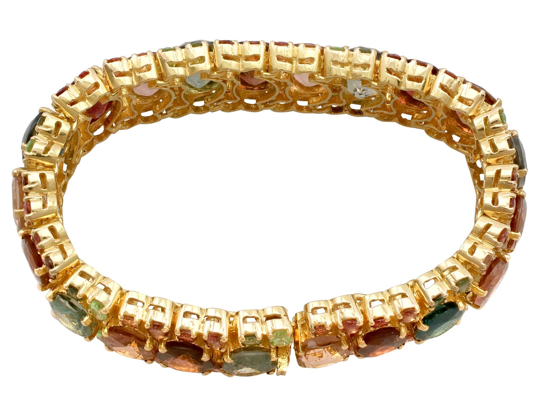 Retro 1980s 96.65 Carat Tourmaline Peridot 18 Yellow Gold Bracelet For Sale