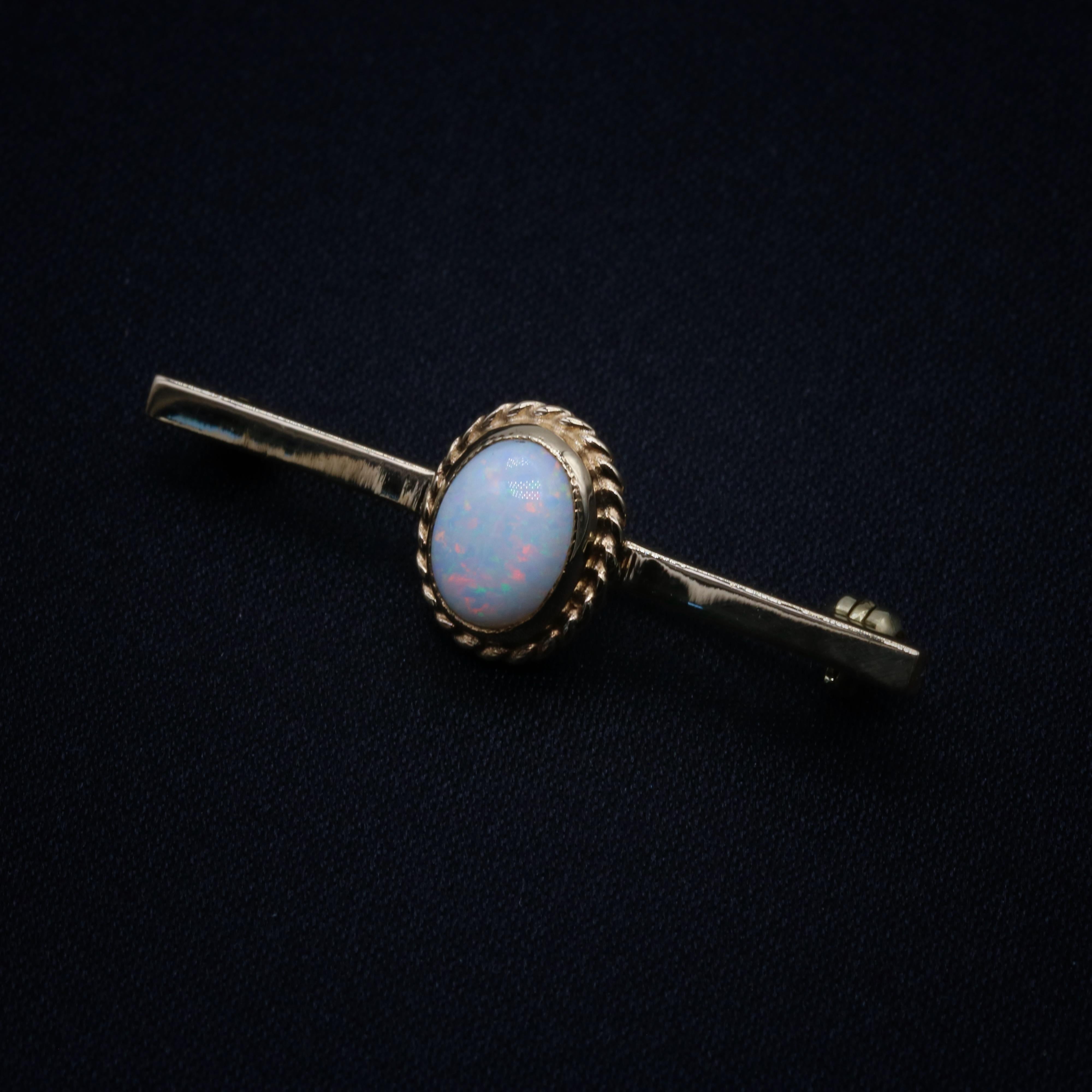 Cabochon Vintage 1980s 9K Yellow Gold Opal Solitaire Bar Brooch For Sale