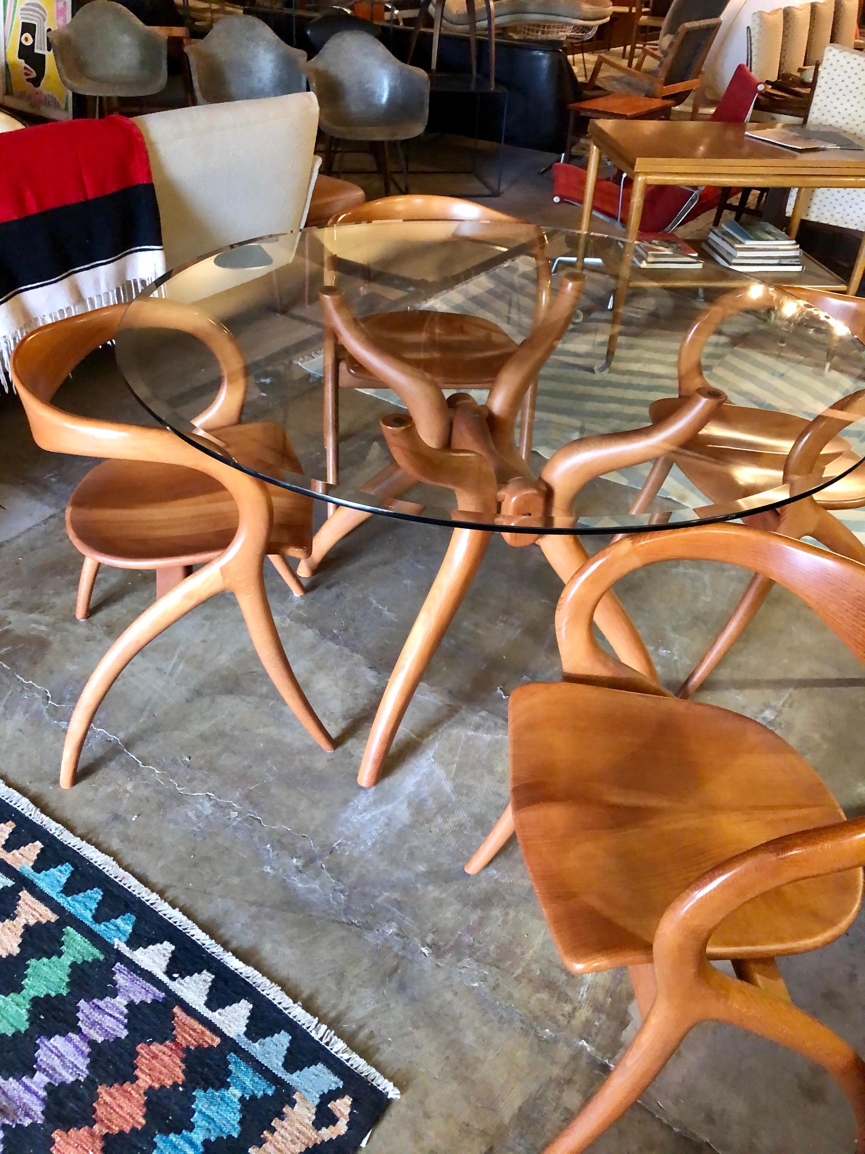 Designed by A. Sibau, this table set is in overall good condition. Beveled glass top. Solid cherrywood base and chairs,
circa 1980s, Italy.
Dimensions:
21
