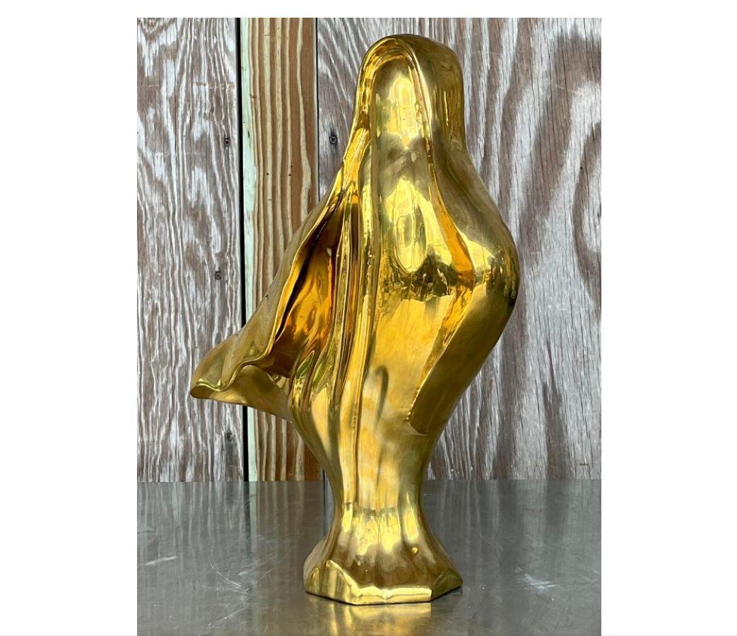 A fabulous vintage 80s brass sculpture. A chic Abstract composition in a high polished shine. Acquired from a Miami estate.