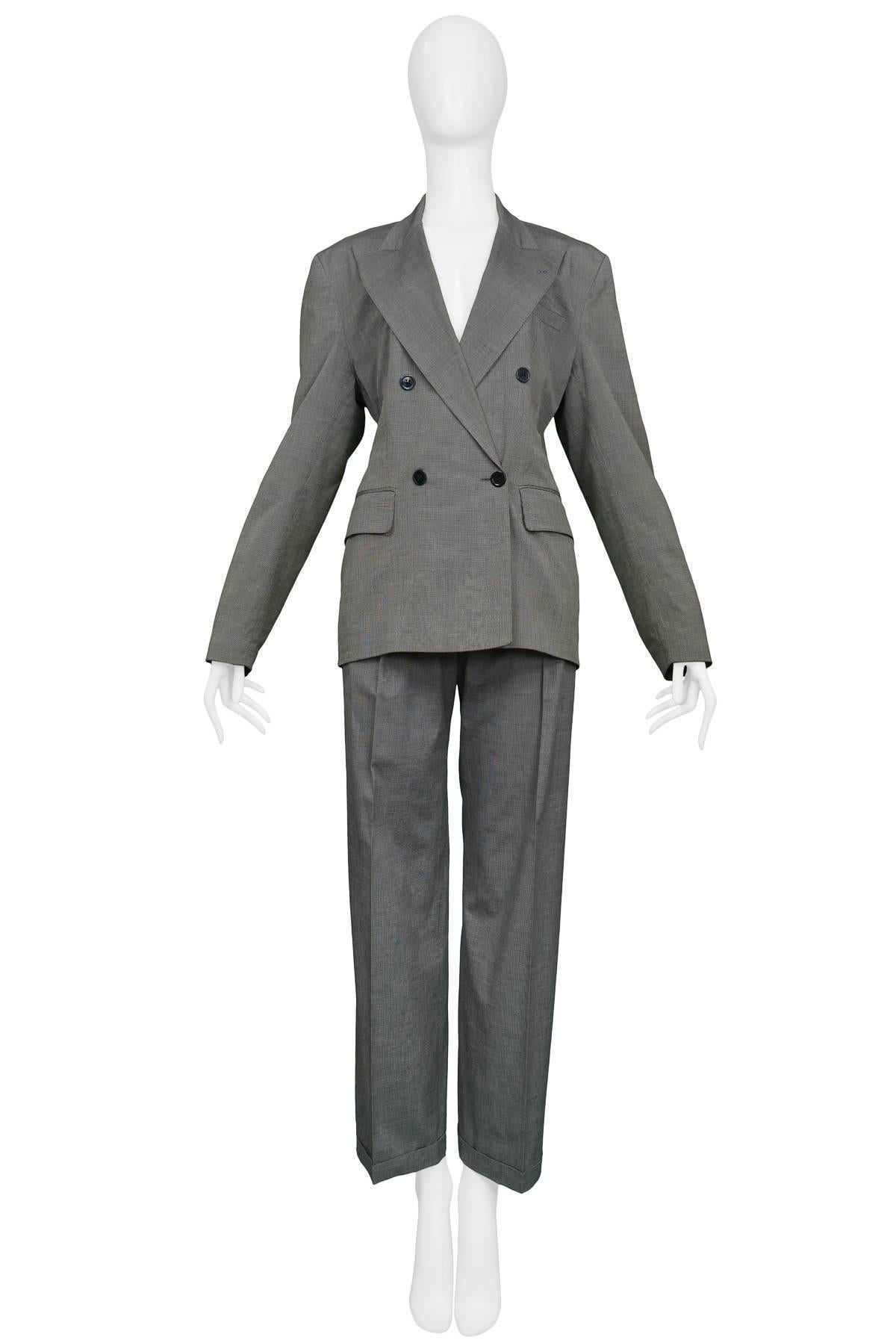 Vintage Azzedine Alaia grey, black & white cotton tiny check suit featuring a double breasted jacket with black buttons. Pleated front trouser style pants. 

