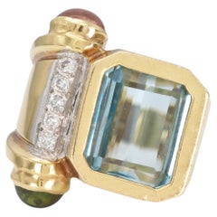 Anillo vintage de aguamarina, diamantes y turmalina de los años 80