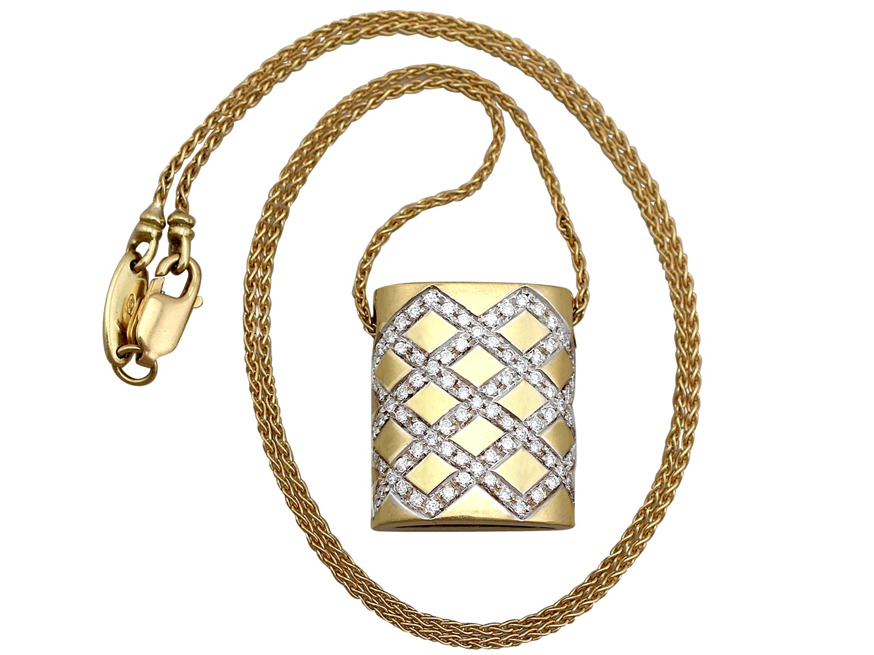 A fine and impressive vintage Belgian 0.65 carat diamond and 18 karat yellow gold, 18 karat white gold set pendant; part of our vintage jewelry and estate jewelry collections.

This fine and impressive vintage pendant has been crafted in 18k yellow