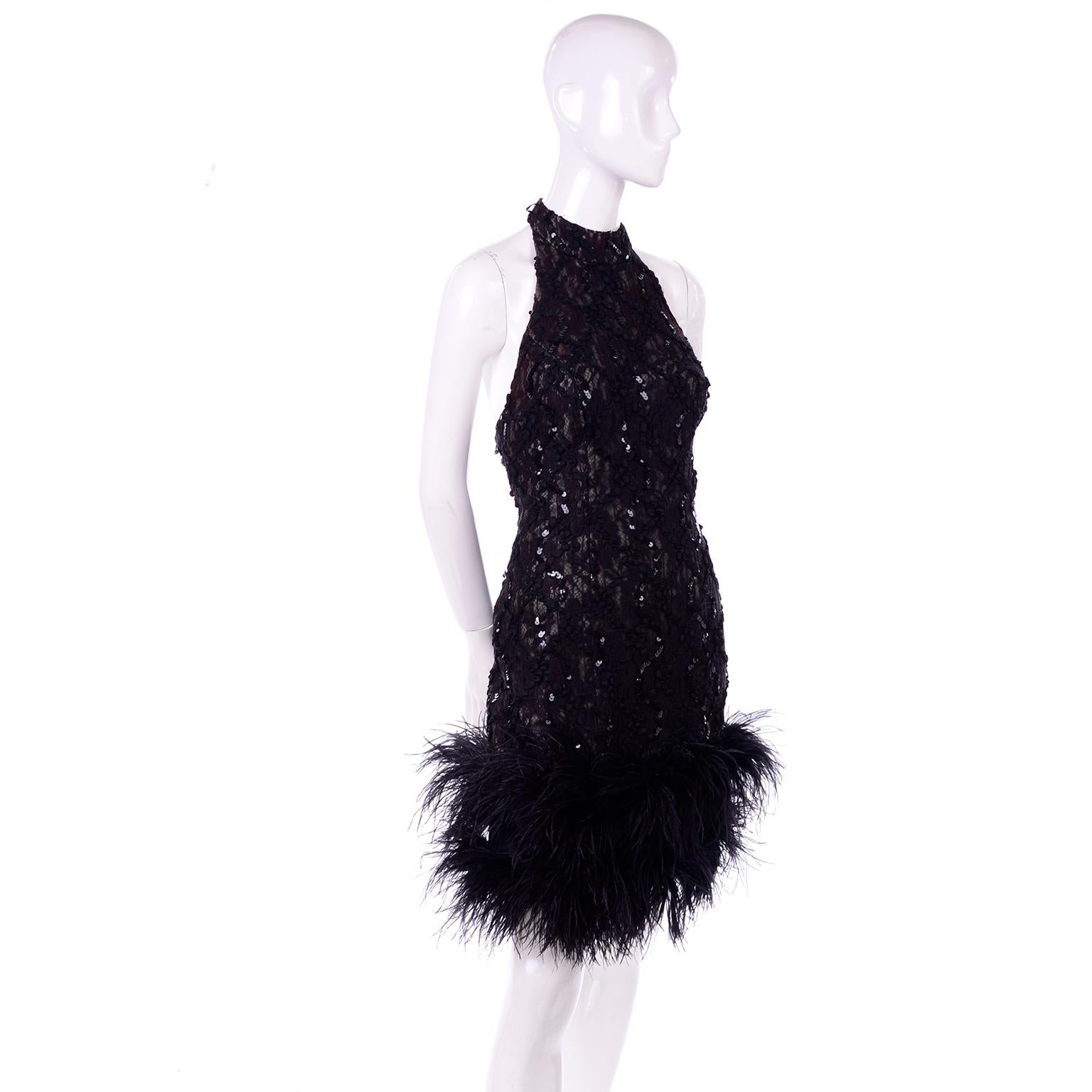 hand-sequined trapeze halter dress with feather trim in ivory