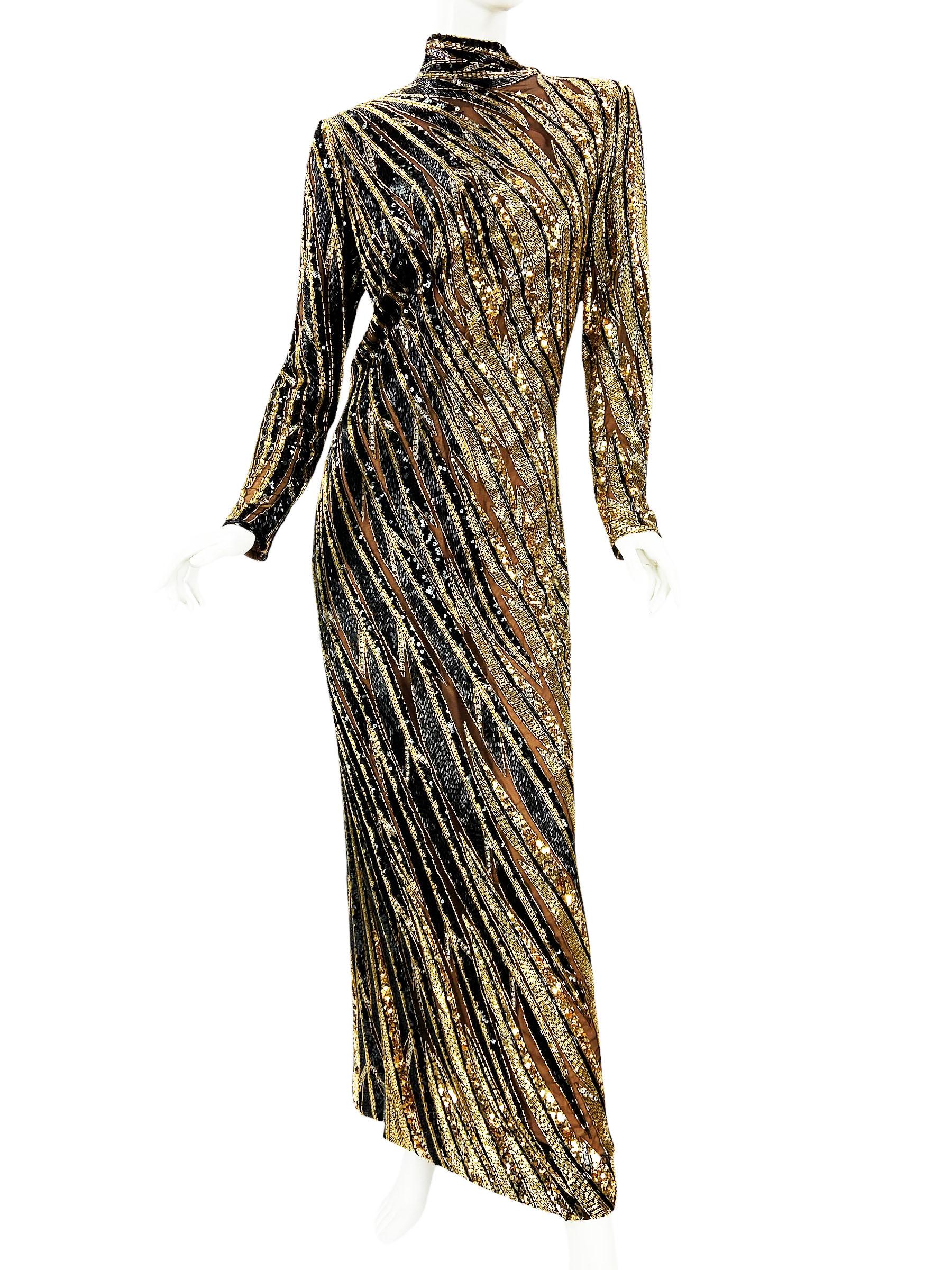 Vintage 1980's Bob Mackie Boutique Fully Embellished Long Dress Gown
Designer size 12 ( modern size will be approx. US 8 - please check our measurements)
Hand Beaded, 100% Silk, Black and Gold Beads with Sequins Over the Black Tulle.
Stunning Heavy