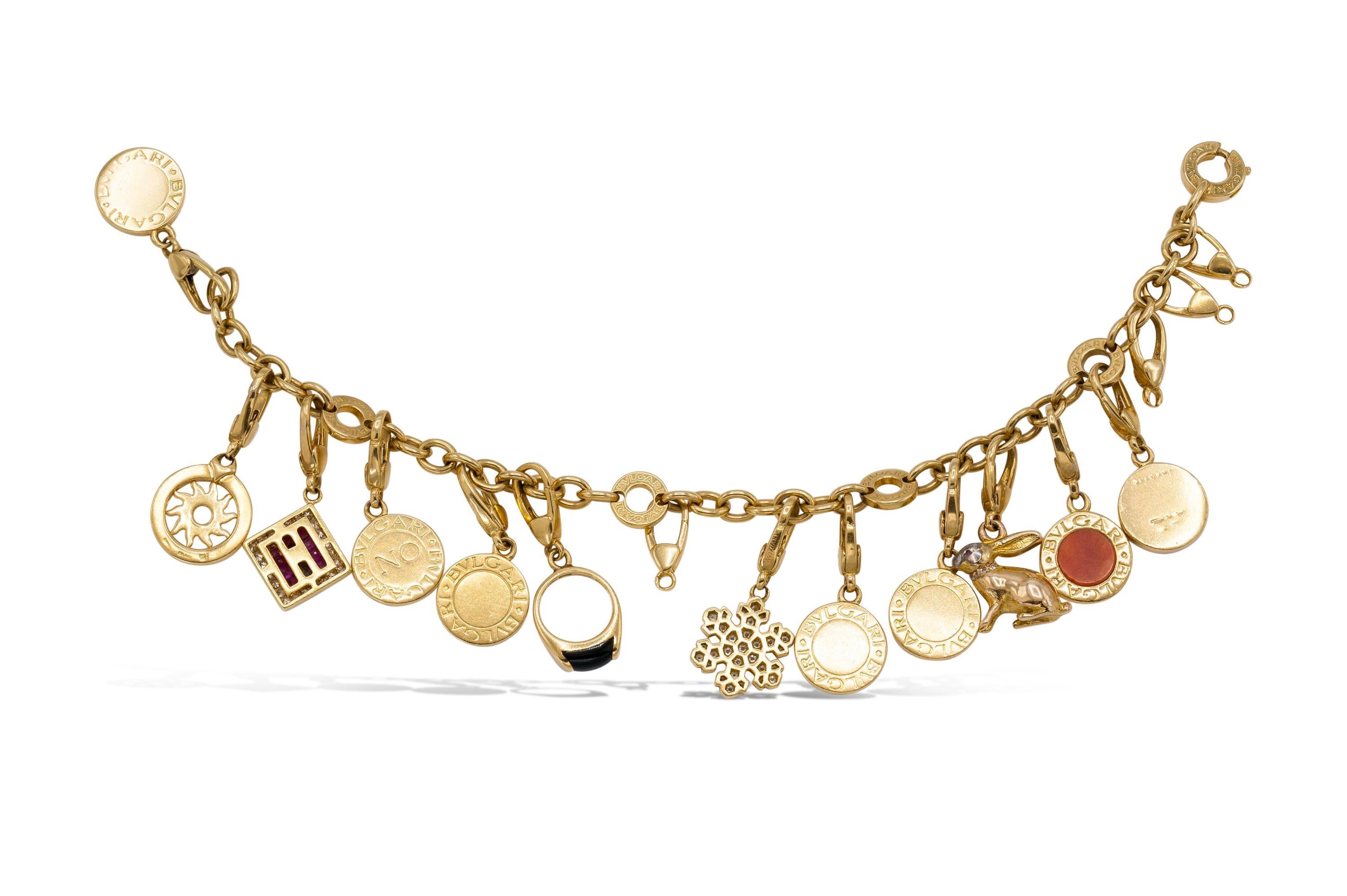 Finely crafted in 18K yellow gold with 12 original Bvlgari charms with various precious and semi-precious stones.
Signed by Bvlgari
Size 7 inches