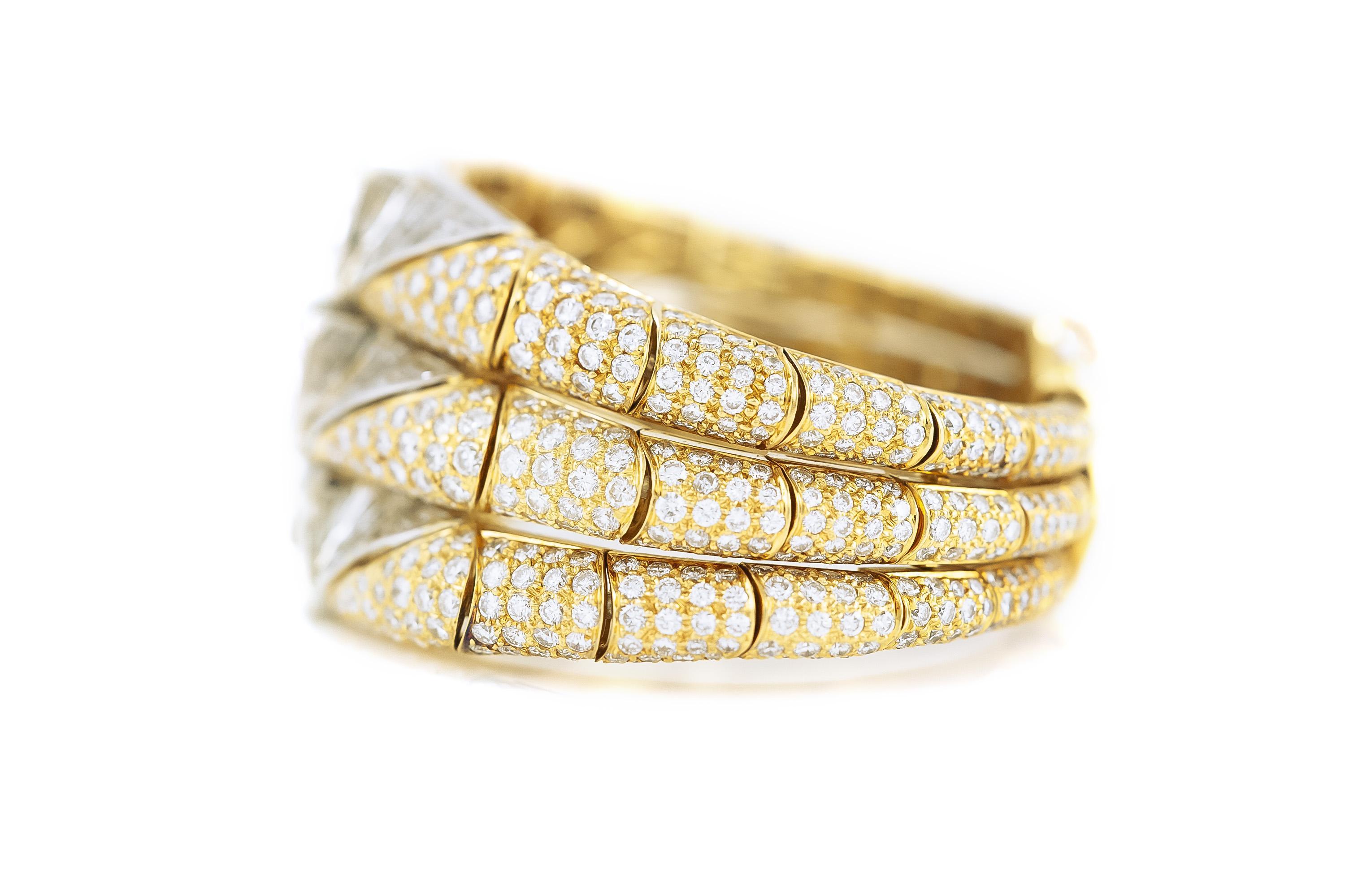 Finely crafted in 18k yellow gold and platinum with 3 GIA certified Emerald cut Diamonds;
5.15 carats, G color, VS1 clarity, GIA#15830679
5.03 carats, F color, VS1 clarity, GIA #15830678
5.01 carats, H color, VS1 clarity, GIA #5101563765
The