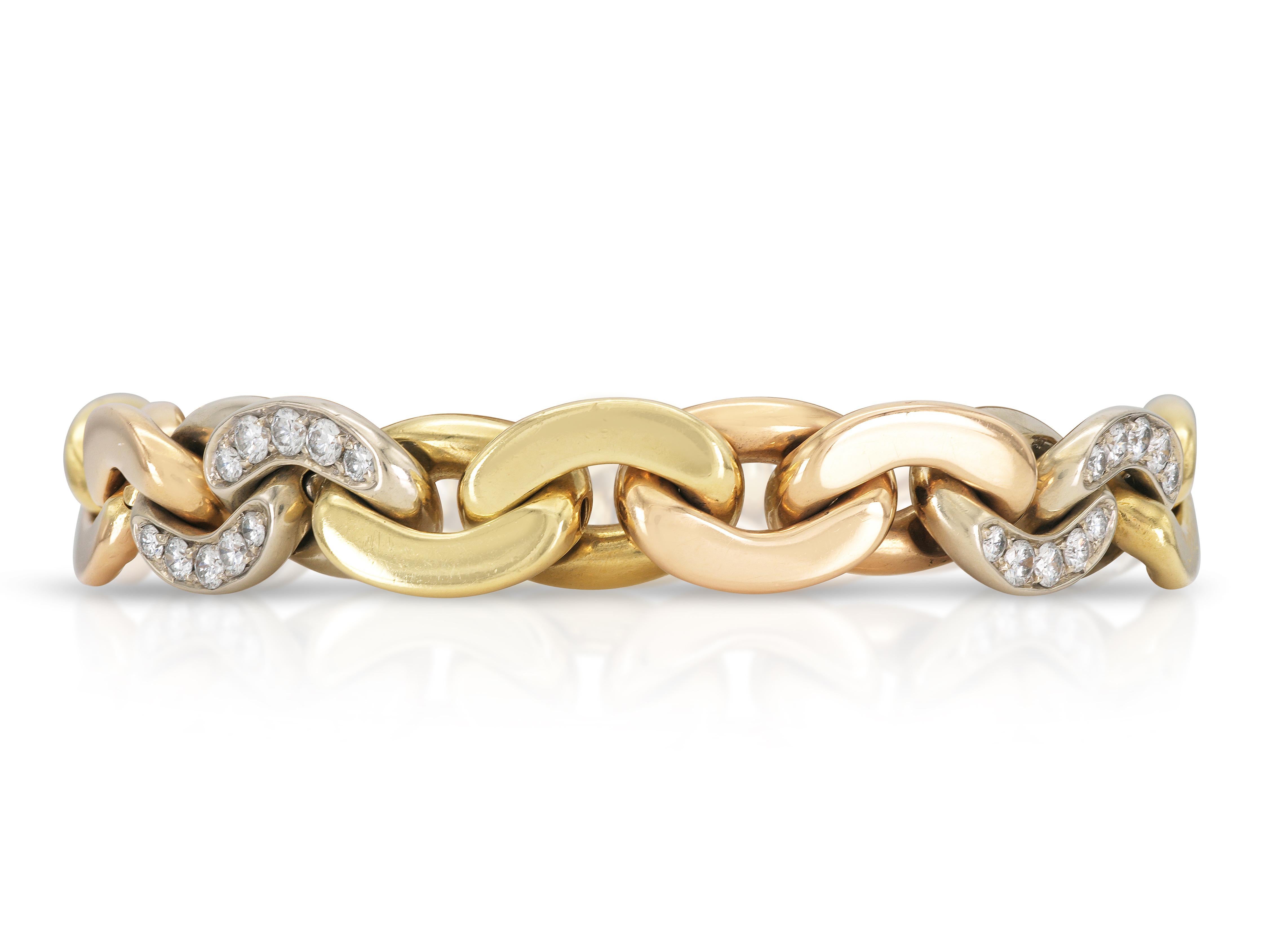 Finely crafted in 18k yellow, rose, and white gold with Round Brilliant cut Diamonds weighing approximately a total of 3.00 carats.
Circa 1980s
Signed by Bvlgari
Size 7 1/4 inches