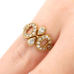 Bague vintage « C de Cartier » des années 1980, en or jaune, sertie d'un diamant en forme de poire