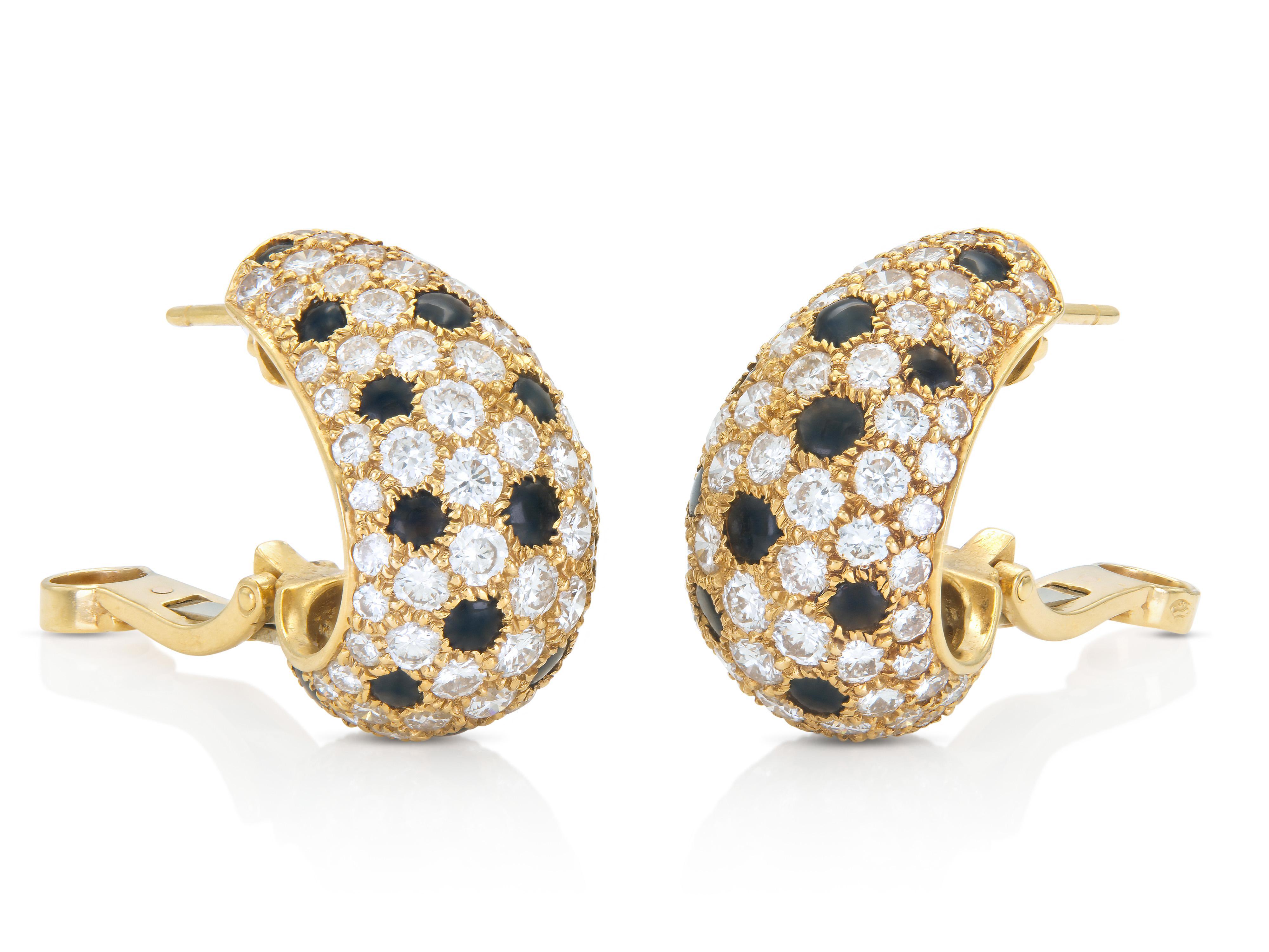 Finely crafted in 18k yellow gold with Round Brilliant cut Diamonds and Onyx.
Signed by Cartier
Circa 1980s
Each earring: 3/4 x 1/2 inch