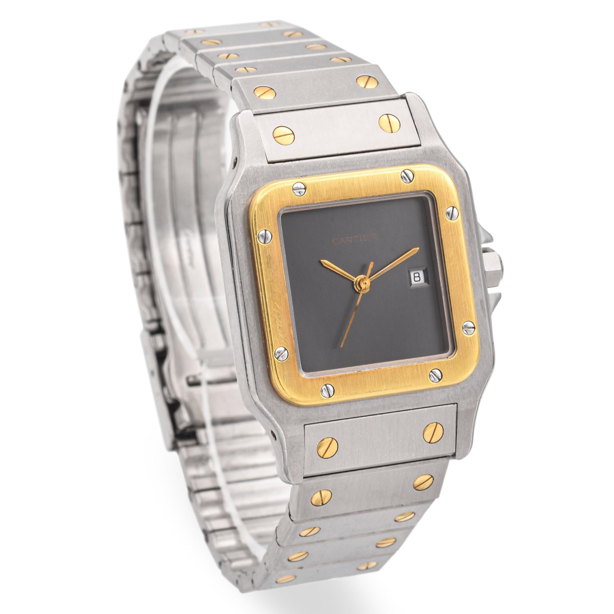 Beautiful 1980's Cartier Santos watch in great condition. The rare gray dial is referred to as Ghost Dial and is very thought after. The watch is pre owned with some minor wear.

Weight: 86.8 Grams
Case Size: 29 mm
Band Length: 7.25 Inches
Reference