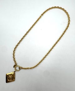Vintage 1980s Chanel Gold Diamond Shape CC Logo Pendant Necklace
