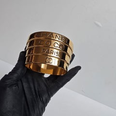Vintage 1980s Chanel Gold Stack Optic Logo Bangle