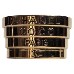 Vintage 1980s Chanel Gold Stack Optic Logo Bangle