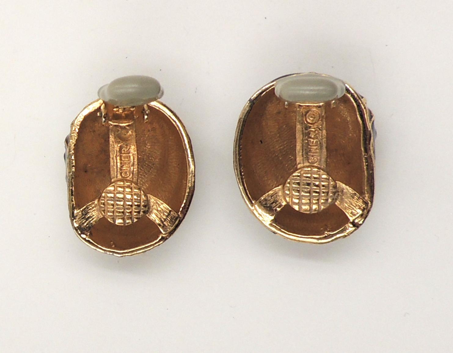 1980s goldtone domed cabochon faux-onyx with brown and black enamel stripes clip back earrings. Marked 