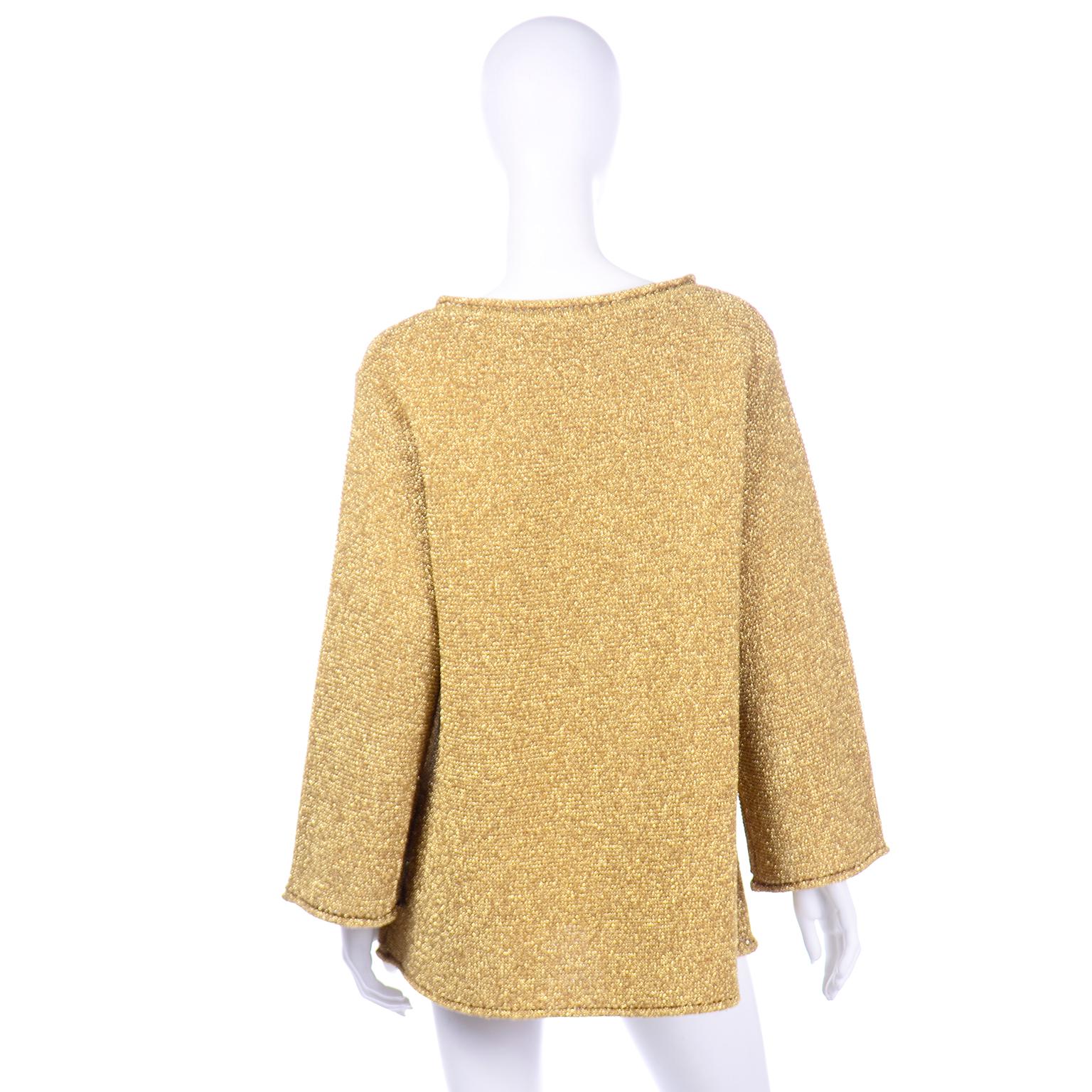gold pullover sweater