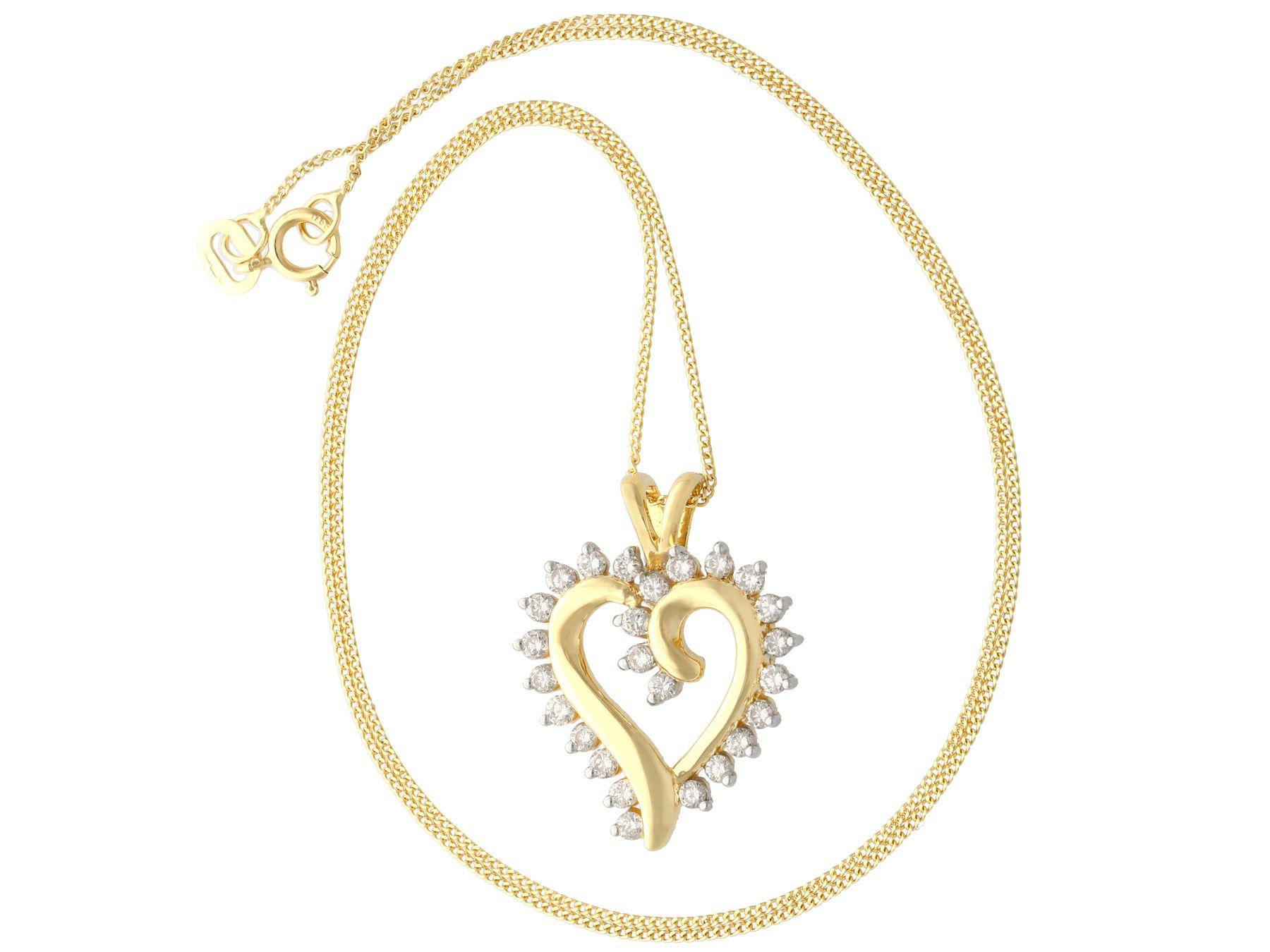 An impressive vintage 0.39Ct diamond and 18k yellow gold, 18k white gold set heart shaped pendant; part of our diverse antique jewelry and estate jewelry collections.

This fine and impressive diamond heart pendant has been crafted in 18k yellow