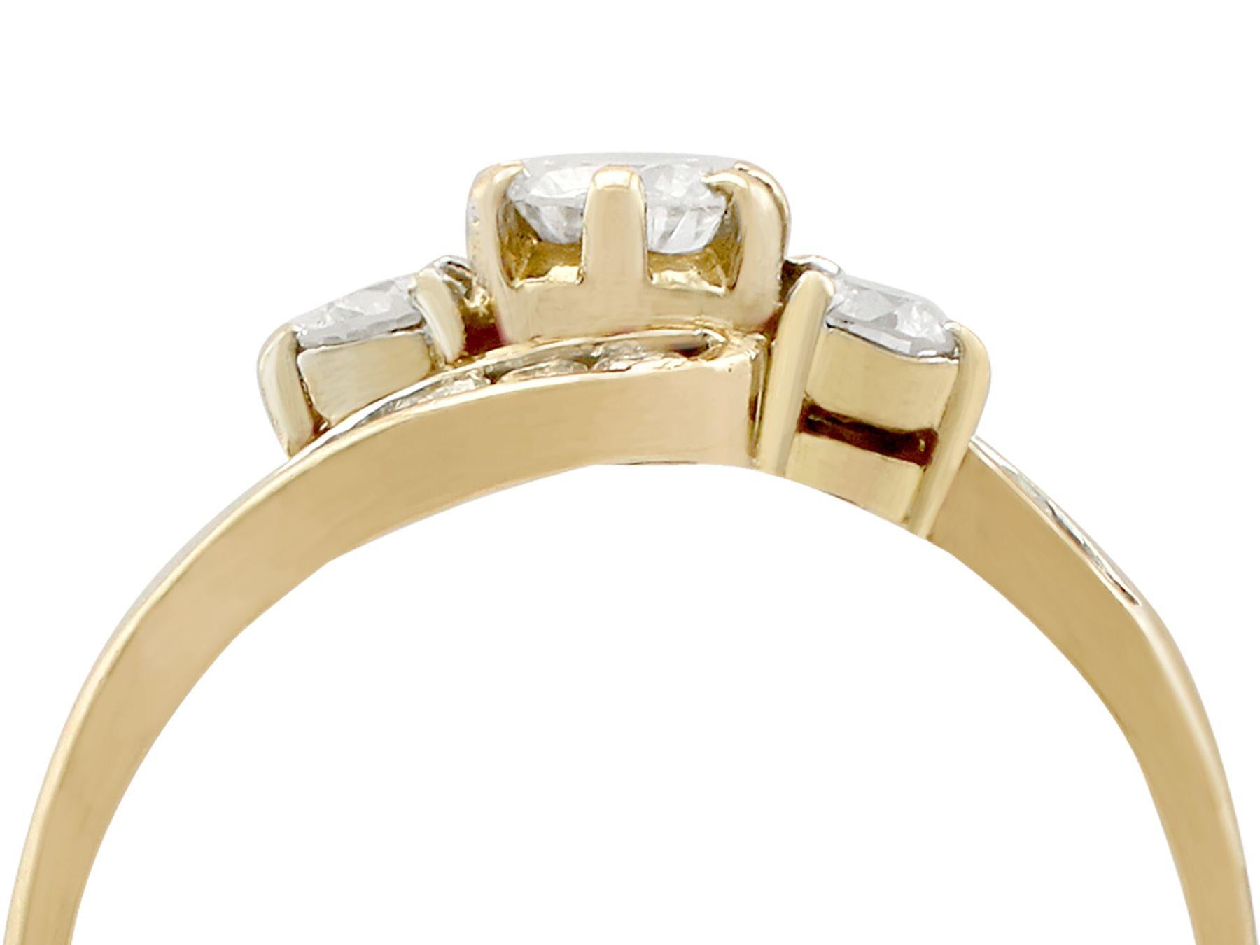 An impressive vintage 1980s 0.67 carat diamond and 18k yellow gold twist style dress ring; part of our diverse diamond jewelry and estate jewelry collections.

This fine and impressive diamond dress ring has been crafted in 18k yellow gold.

The