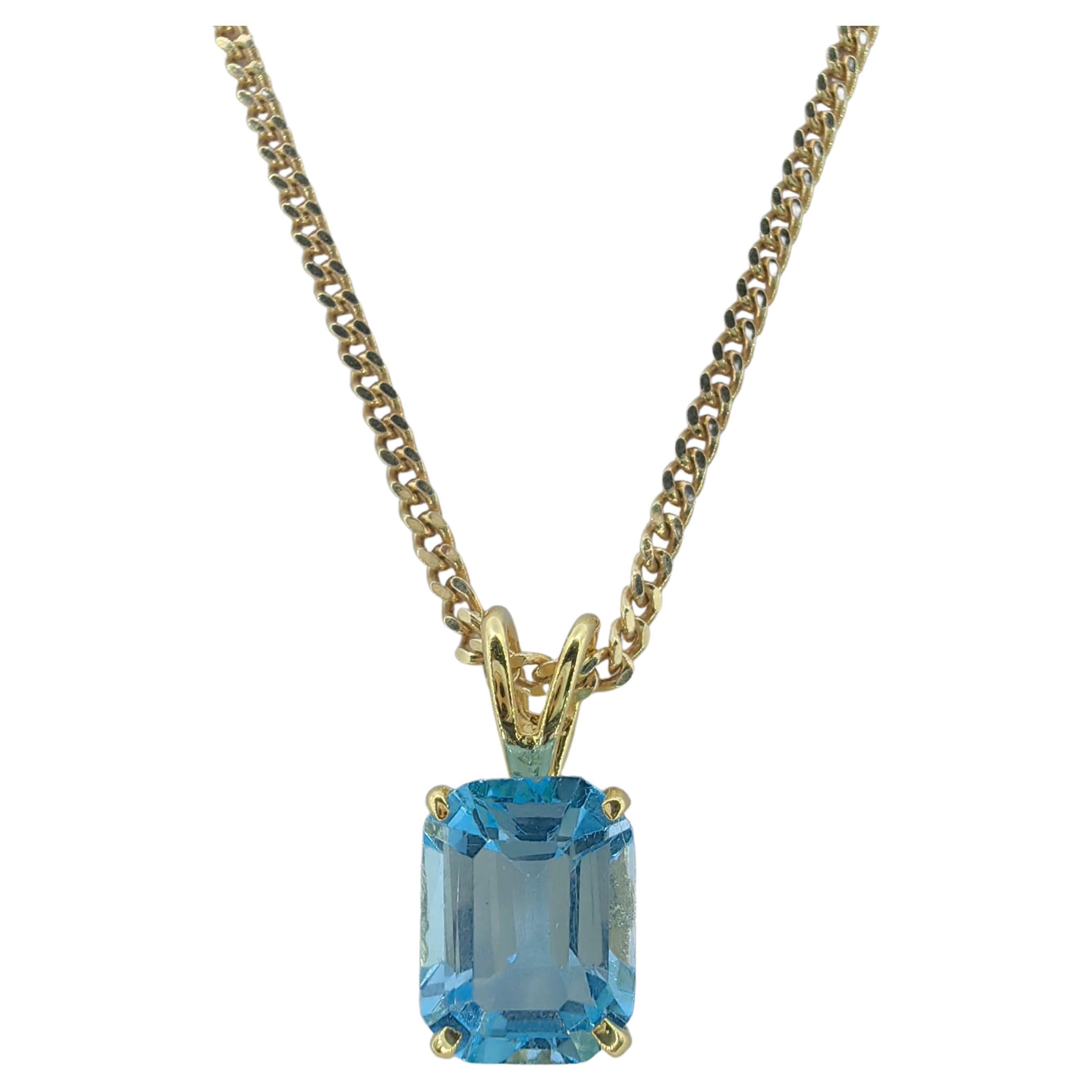 Vintage 1980's Emerald Cut Blue Topaz Necklace Pendant in 14K Yellow Gold #1