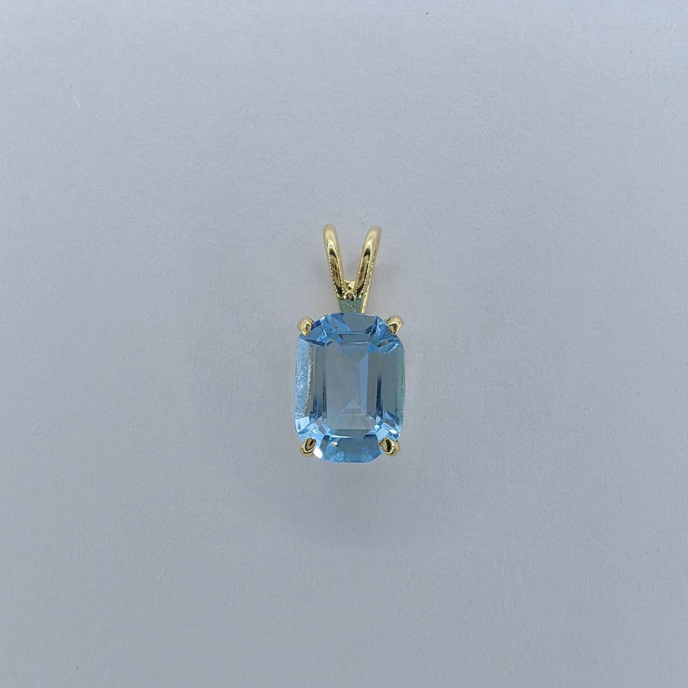 Vintage 1980's Emerald Cut Blue Topaz Necklace Pendant in 14K Yellow Gold #2 For Sale 1