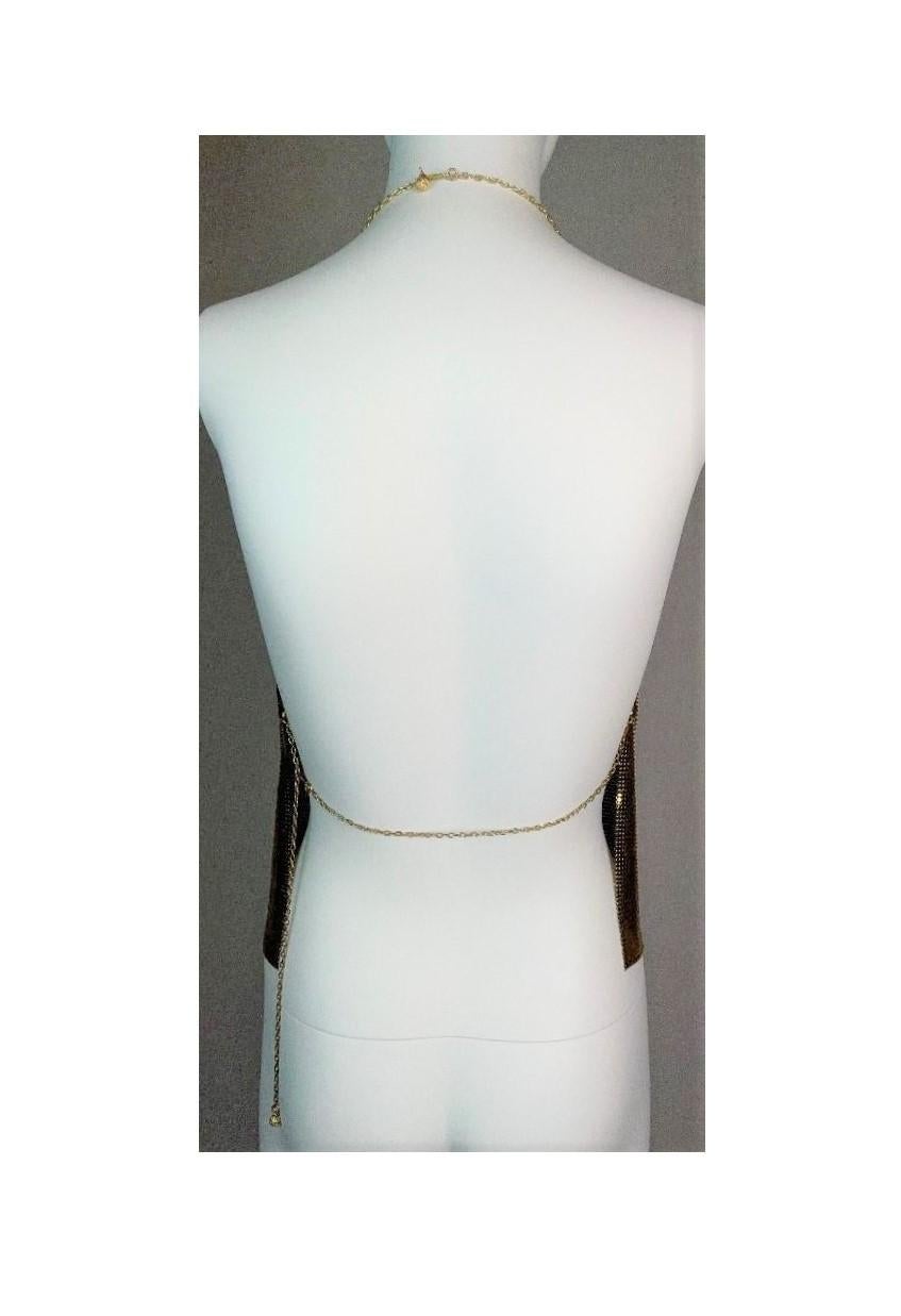 **THANK YOU FOR SHOPPING WITH MES DEUX FILLES**

DESIGNER: 1980's Gianni Versace
CONDITION: Good- no flaws
FABRIC: Metal
COUNTRY: Italy
SIZE: None- adjustable chain straps- probably best for XS to M
MEASUREMENTS; provided as a courtesy only- not a