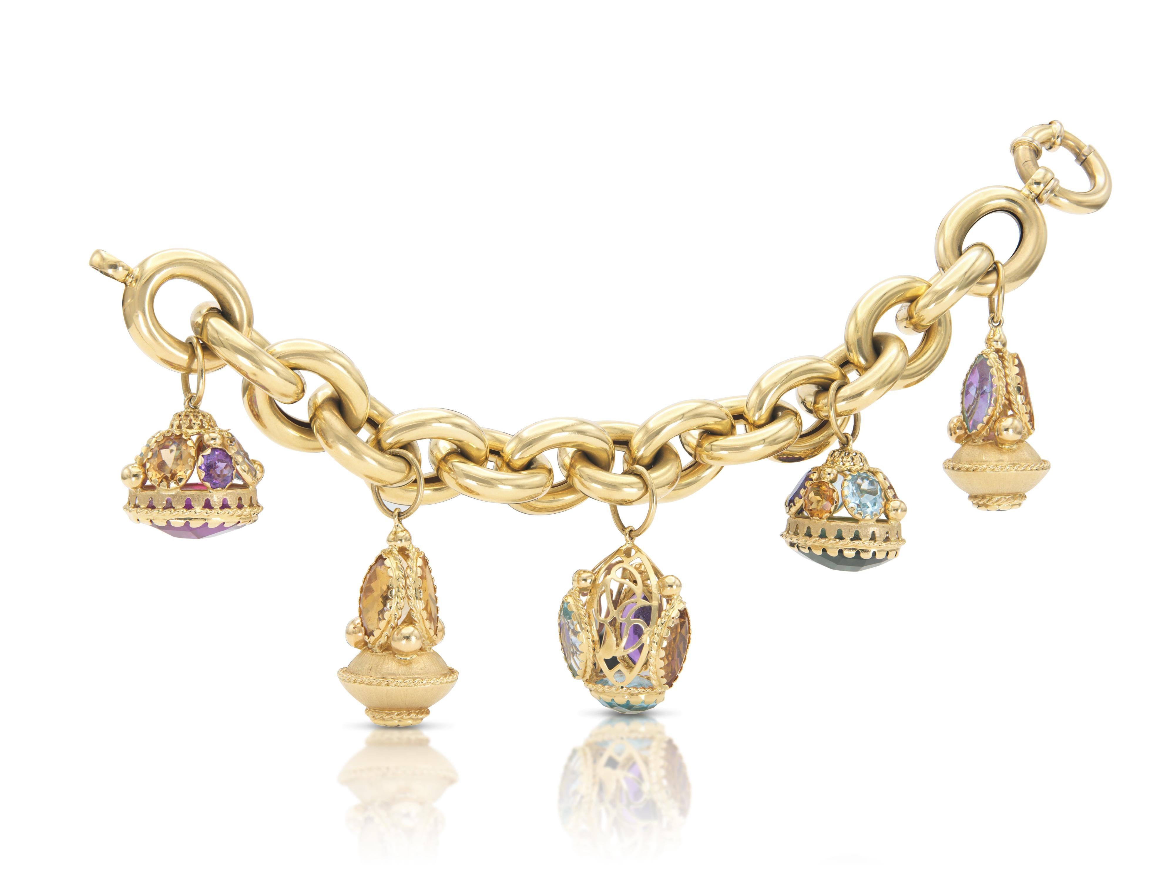 Finement réalisé en or jaune 18 carats avec des pierres précieuses multicolores.
Circa 1980
Taille 8 1/2 pouces