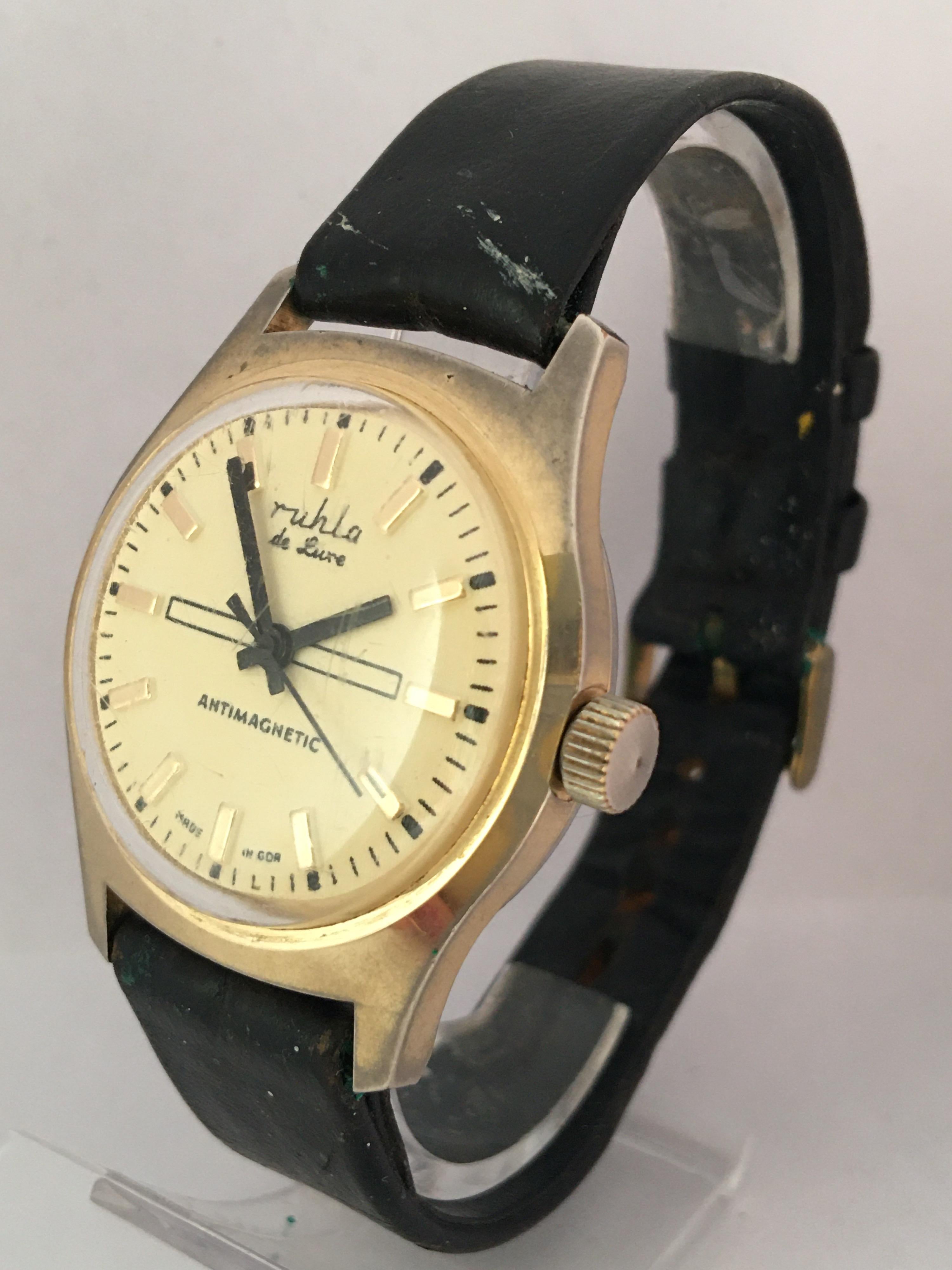 This beautiful pre-owned vintage hand winding watch is in good working condition and it is running well. Visible signs of ageing and wear with light scratches on the glass and on the watch case as shown. The gold plated watch case is tarnished as
