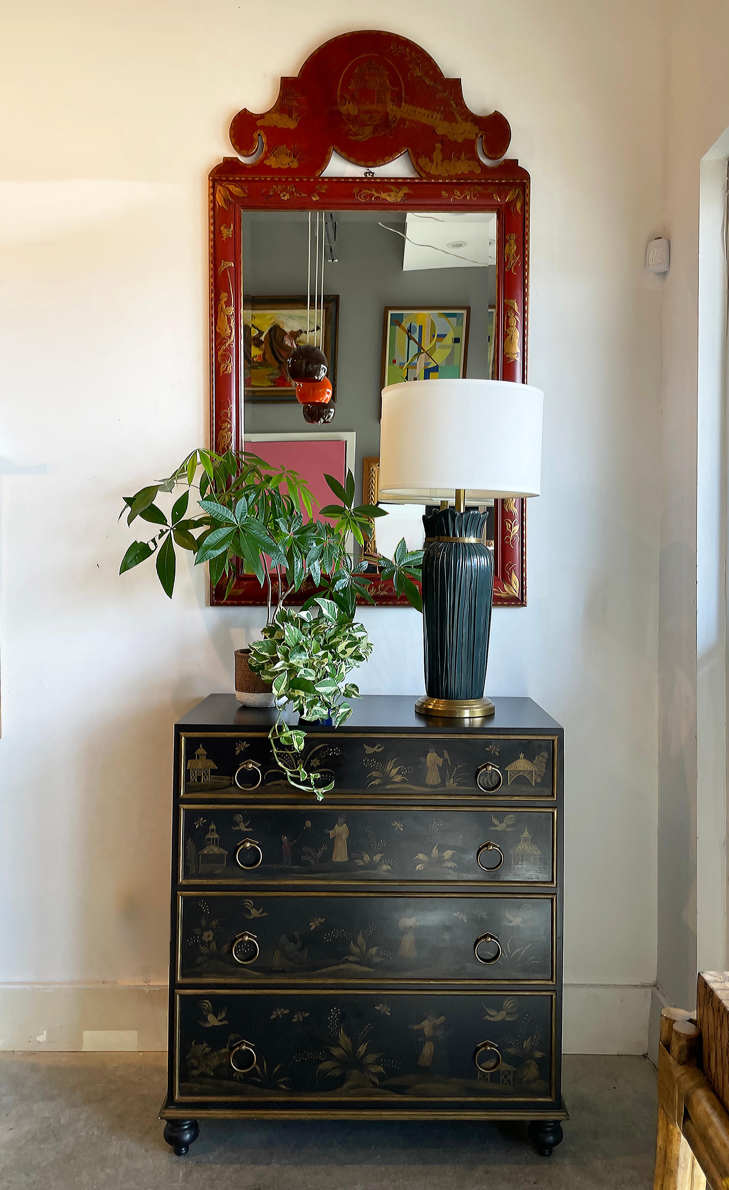 Vintage 1980s hand-painted Chinoiserie cabinet Chest of drawers

Offered for sale is a vintage 1980s hand-painted Chinoiserie-style cabinet with great details and lovely brass hardware. The chest is quite elegant with black and gold themes
