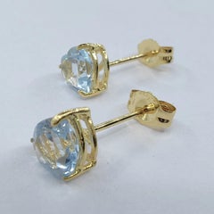 Vintage 1980's Heart-cut Blue Topaz Stud Earrings in 14K Yellow Gold