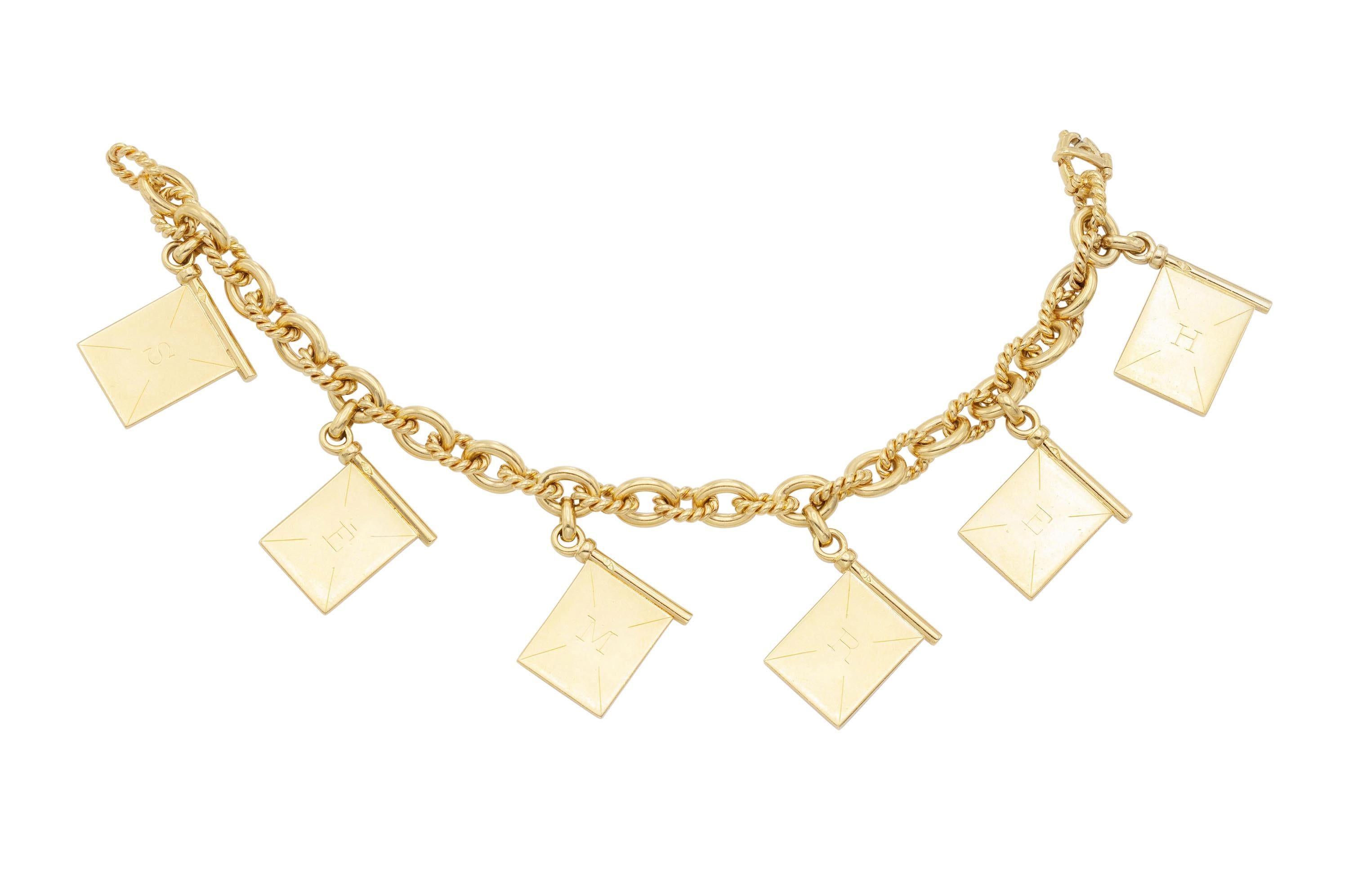 Finemente realizzato in oro giallo 18 carati con ciondoli smaltati raffiguranti bandiere nautiche e la scritta Hermes.
Firmato da Hermes
Circa anni '80
Dimensione 7