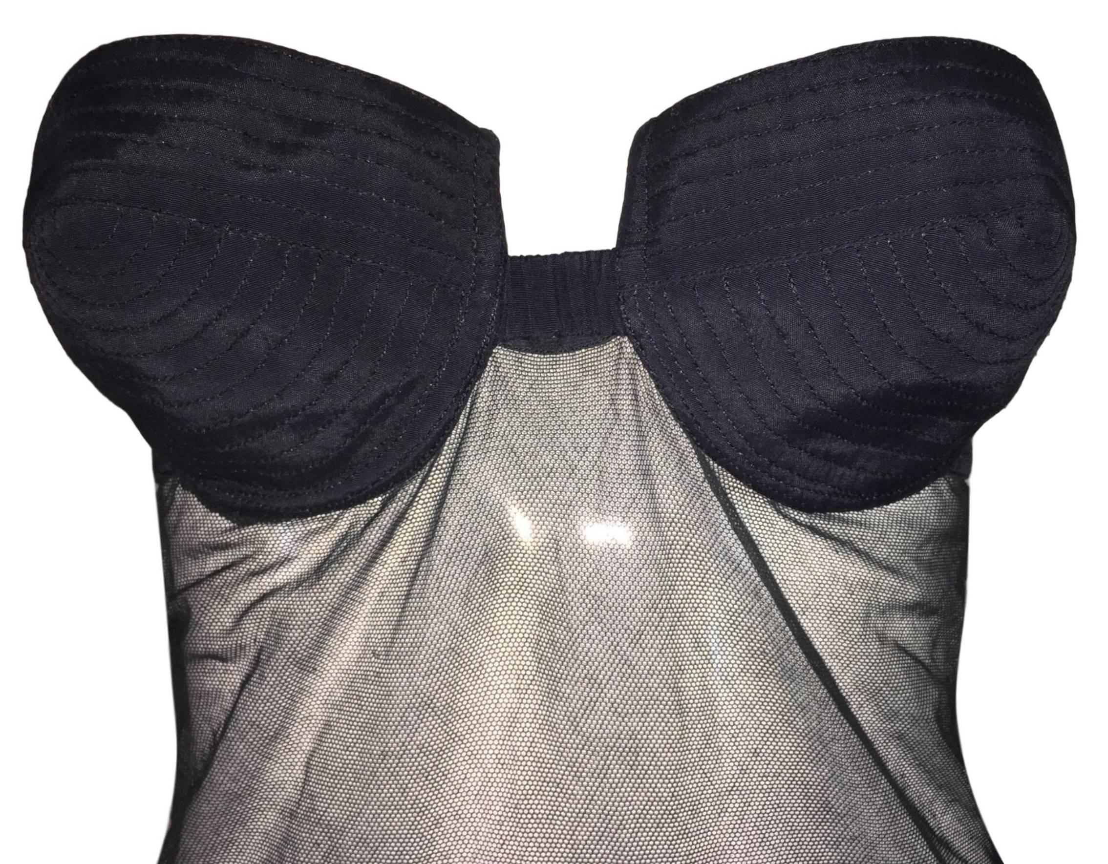 DESIGNER: 1980's Jean Paul Gaultier

Please contact for more information and/or photos.

CONDITION: Good- minor imperfections- please see last 2 photos. The molded cups are not perfectly round.

COUNTRY MADE: Italy

FABRIC: Unknown

SIZE: 40- fits