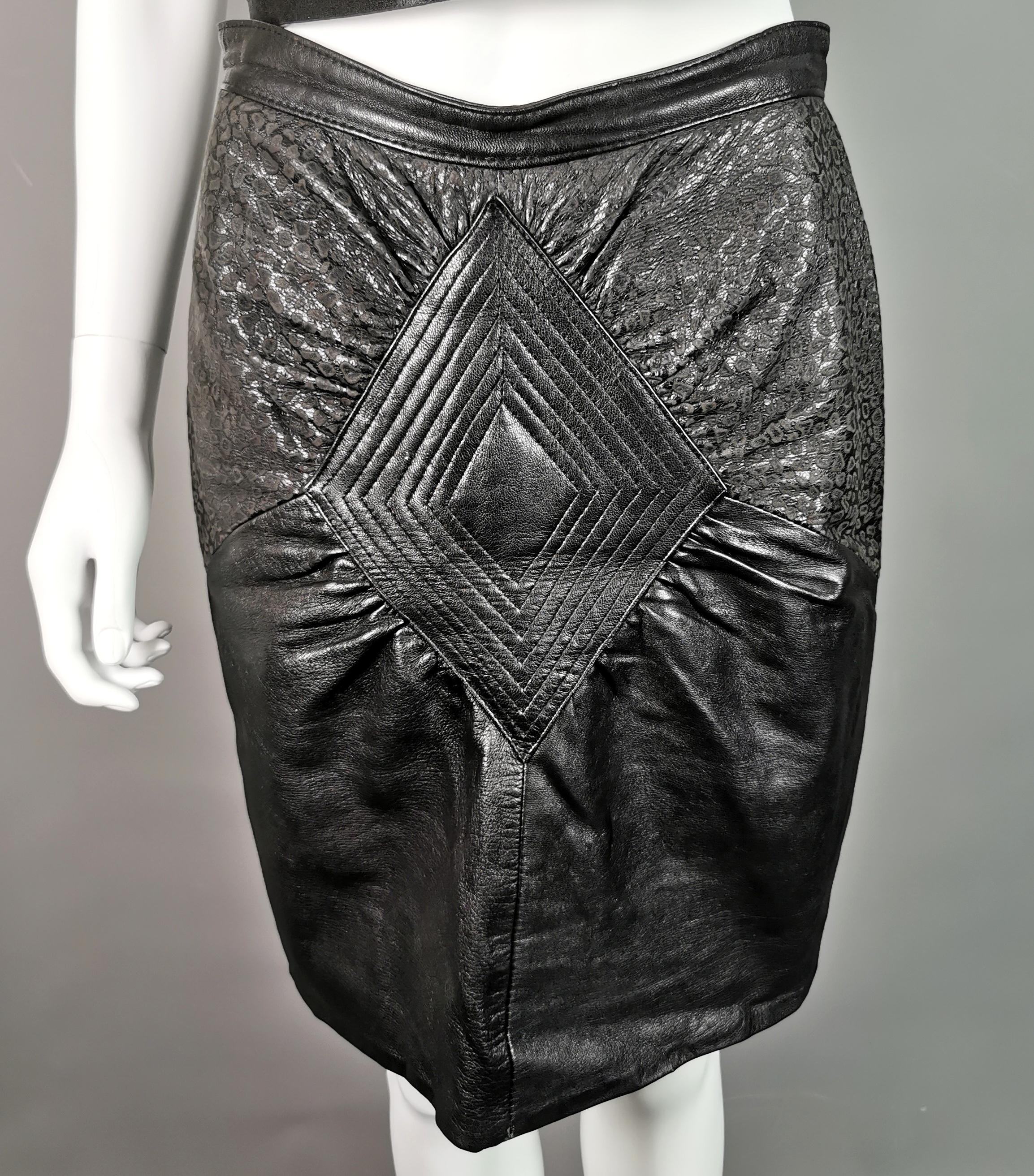 A stylish vintage 1980s leather mini skirt.

This is such a versatile piece and a leather skirt is a real staple that can be dressed up or down in many ways and styles.

This is a figure hugging, pencil silhouette skirt, just above the knee but may